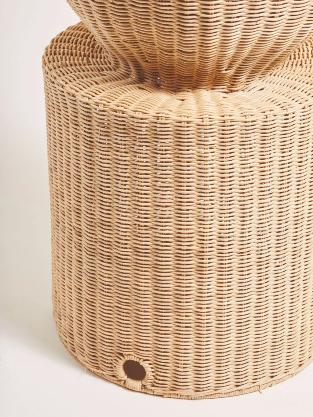Heaps & Woods Luz Standing Lamp, a natural woven rattan floor lamp featuring a sturdy cylindrical base with a subtle tapered neck leading to a rounded upper section, all crafted from light beige hand-woven rattan. This organic modern standing lamp offers a soft, diffused light and brings a touch of boho chic or coastal style to living rooms, bedrooms, or sunrooms.