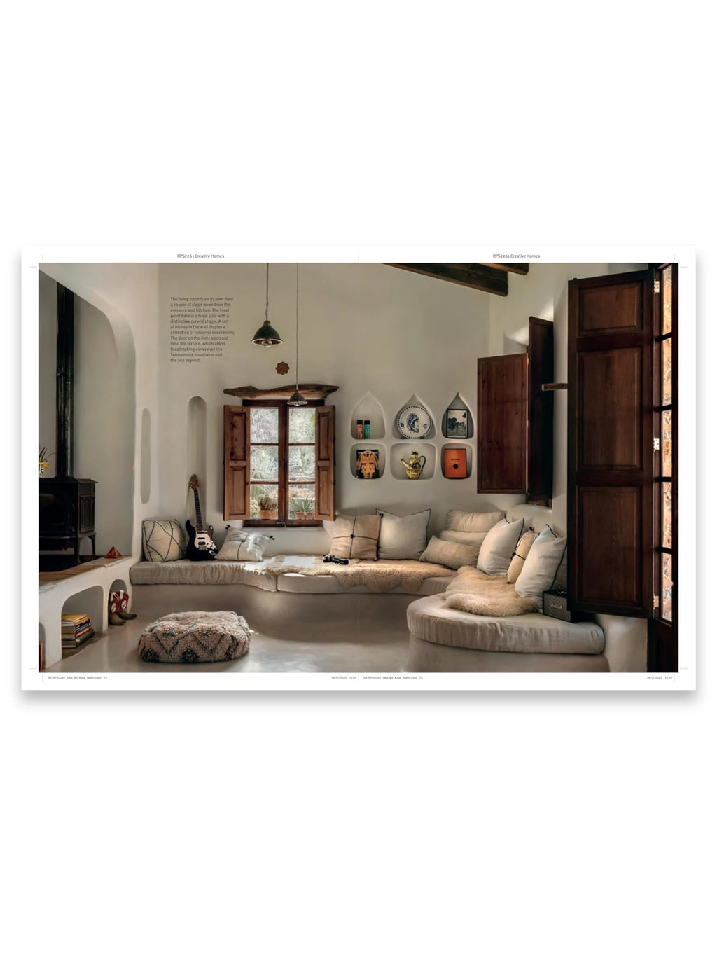 Book Creative Homes, a captivating interior design book showcasing a spacious living room with a large, curved built-in sofa adorned with neutral cushions and sheepskin throws. This inspiring book is ideal for home decor enthusiasts seeking modern, rustic, and bohemian design ideas.