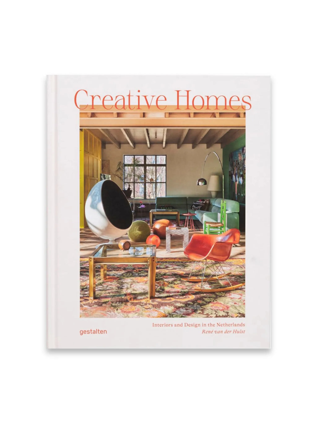 Book Creative Homes Netherlands, a hardcover book featuring a vibrant interior design cover with a white egg chair, orange Eames rocker, and green sofa. This inspirational interior design book is ideal for home decor enthusiasts and design professionals seeking creative living spaces.