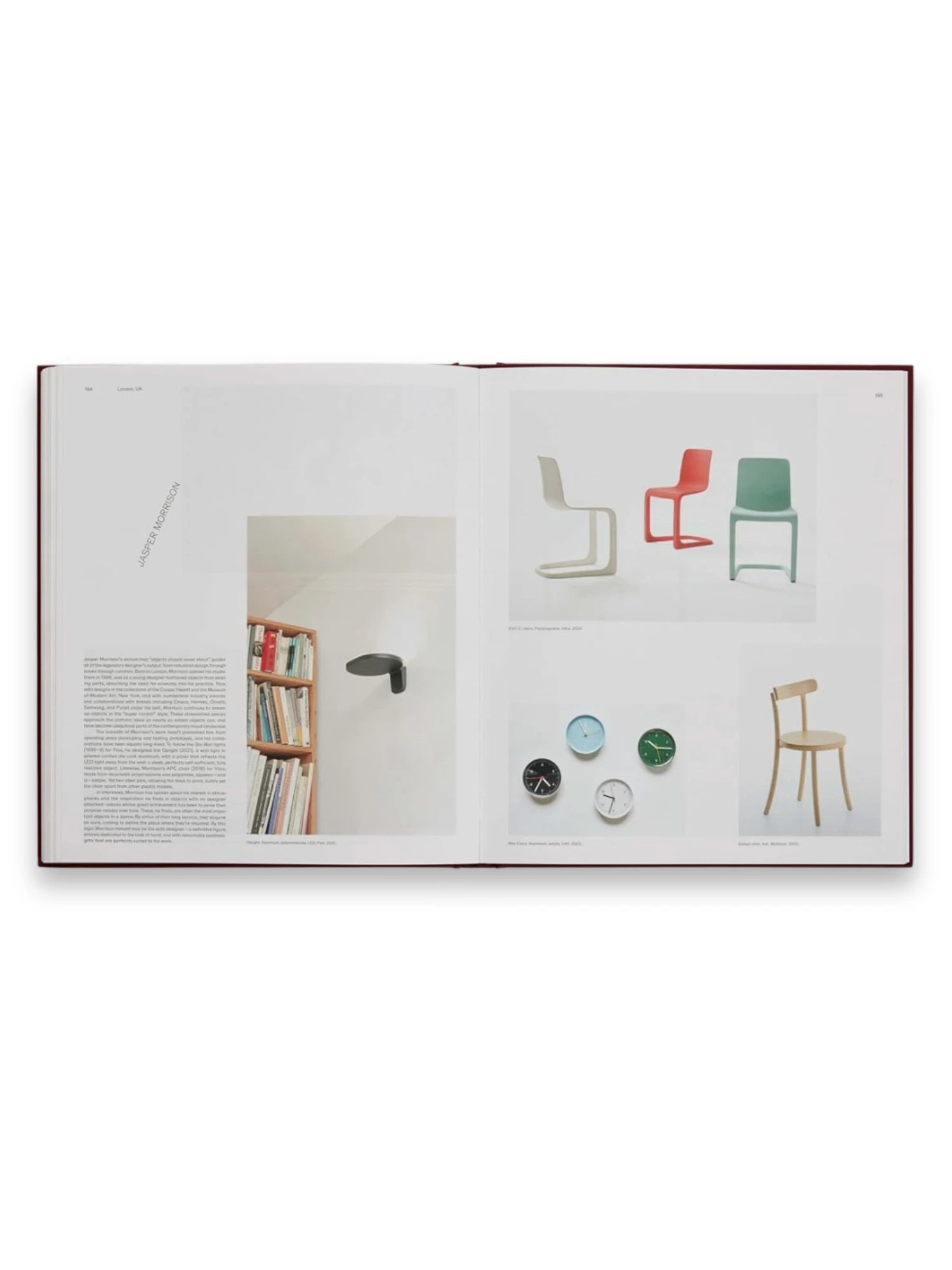 Book Designed for Life, an open hardcover book with a deep red binding, showcasing modern design concepts, colorful chairs, and unique wall clocks on its glossy pages. This insightful book is perfect for interior design enthusiasts, architects, and art students seeking inspiration and historical context.