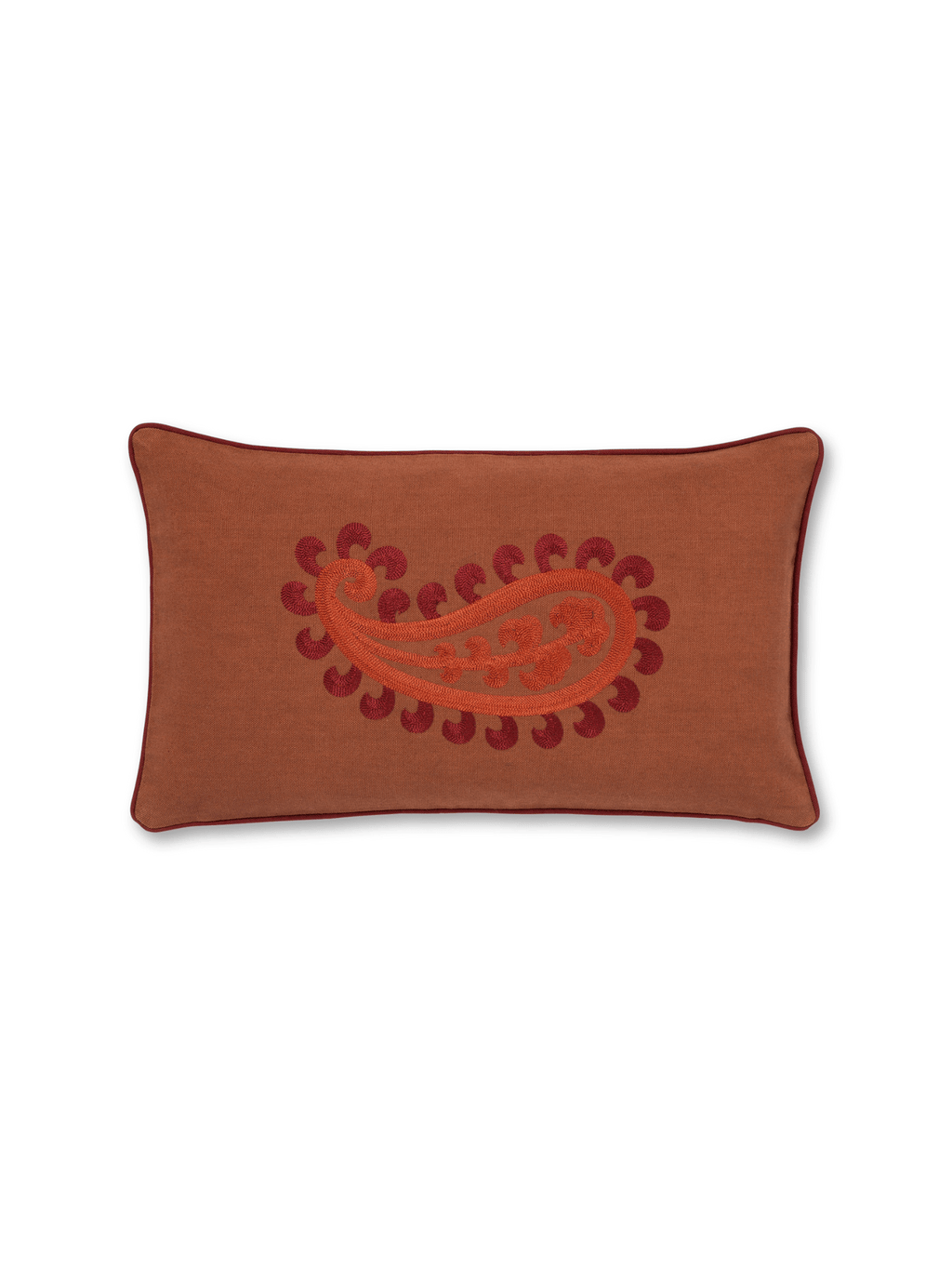 Palais Double Sided Siena Throw Pillow, a rectangular terracotta woven fabric lumbar pillow featuring a vibrant embroidered paisley design in deep orange and red hues. This eclectic accent cushion boasts striking red piping and a reversible design, offering versatile styling for modern bohemian or traditional living room sofas and bedroom armchairs.