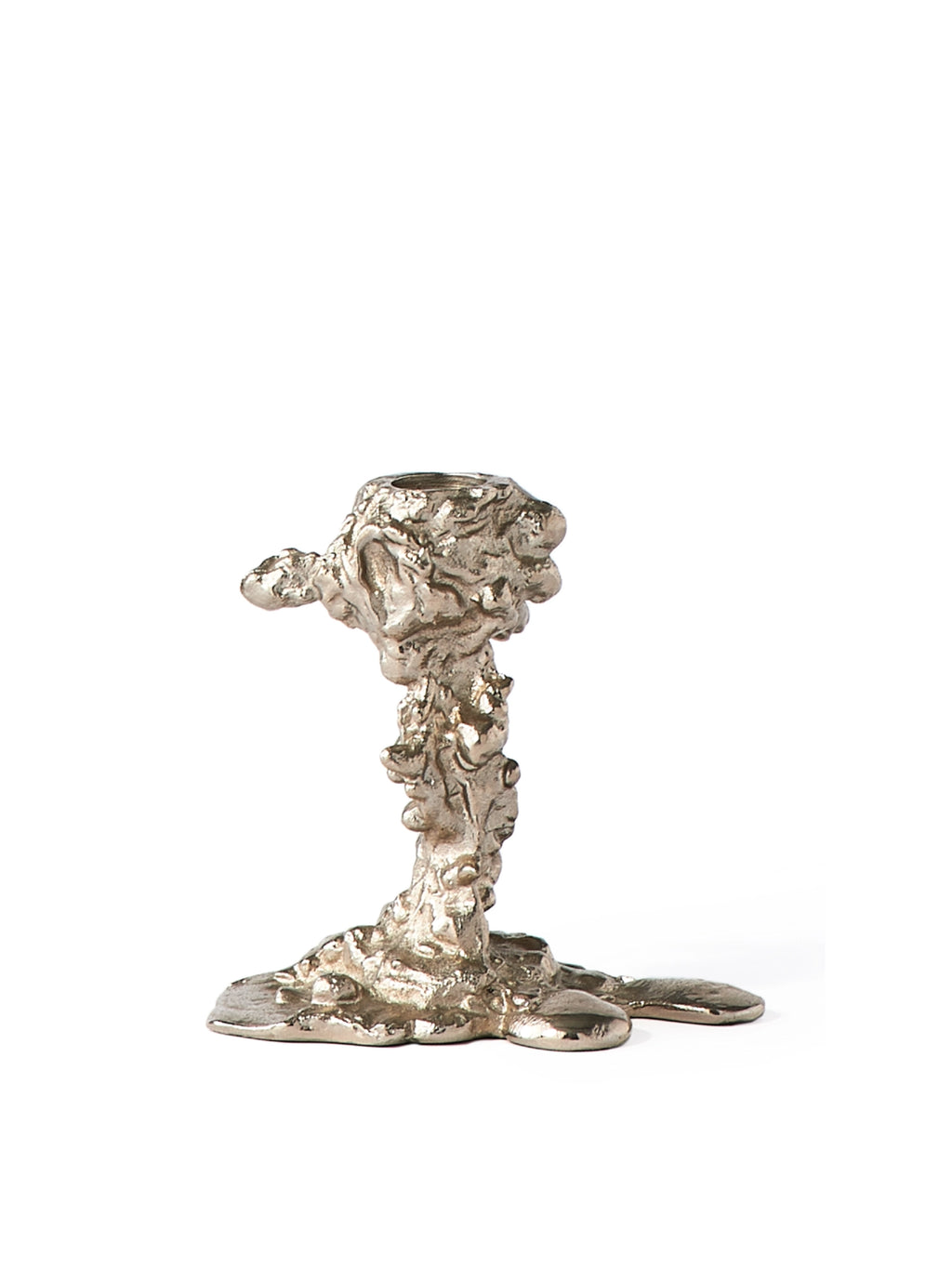 POLSPOTTEN Drip Candle Holder, a sculptural brutalist candle holder crafted from silver-toned polished cast metal with an irregular, molten texture that mimics dripping wax. This unique metallic candlestick offers an organic modern design, perfect for contemporary dining table centerpieces or bold shelf styling in a living room.