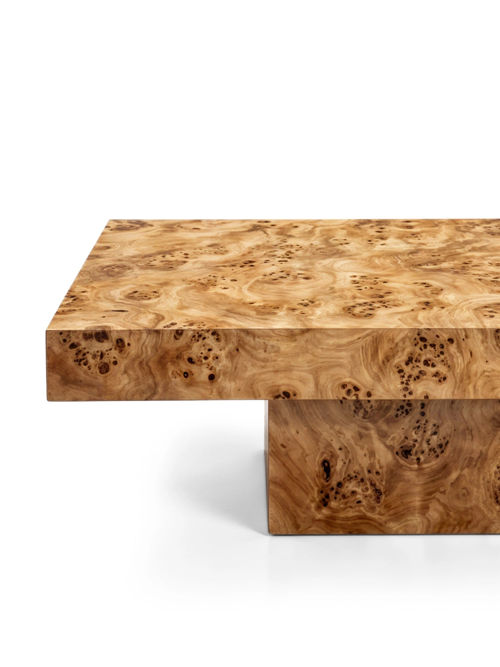 TCL Studios Dune Burlwood Coffee Table, a stunning organic modern coffee table featuring a thick rectangular slab top and cantilevered base crafted from highly figured natural burlwood. This contemporary wood coffee table showcases warm amber and light brown tones with intricate, unique grain patterns and dark knots, offering a luxurious texture.