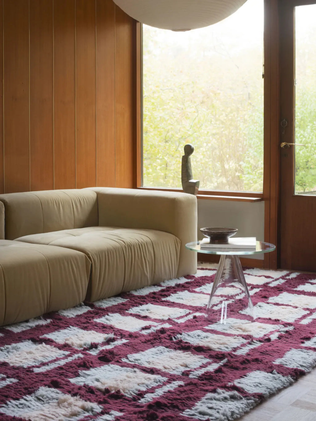 Layered Arbor Shaggy Rug, a thick, plush area rug featuring a modern geometric grid pattern in deep burgundy, light gray, and cream colors. Perfect for adding warmth and texture to contemporary liv...