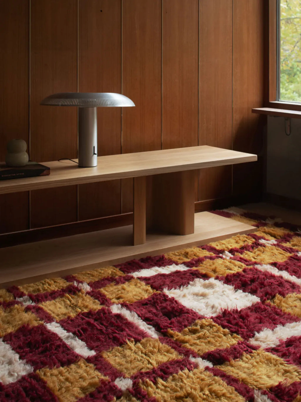 Layered Currant Bush Shaggy Rug, a vibrant shag area rug featuring a playful checkered pattern in rich red, golden yellow, and white tones. Perfect for adding warmth and bold style to any modern li...
