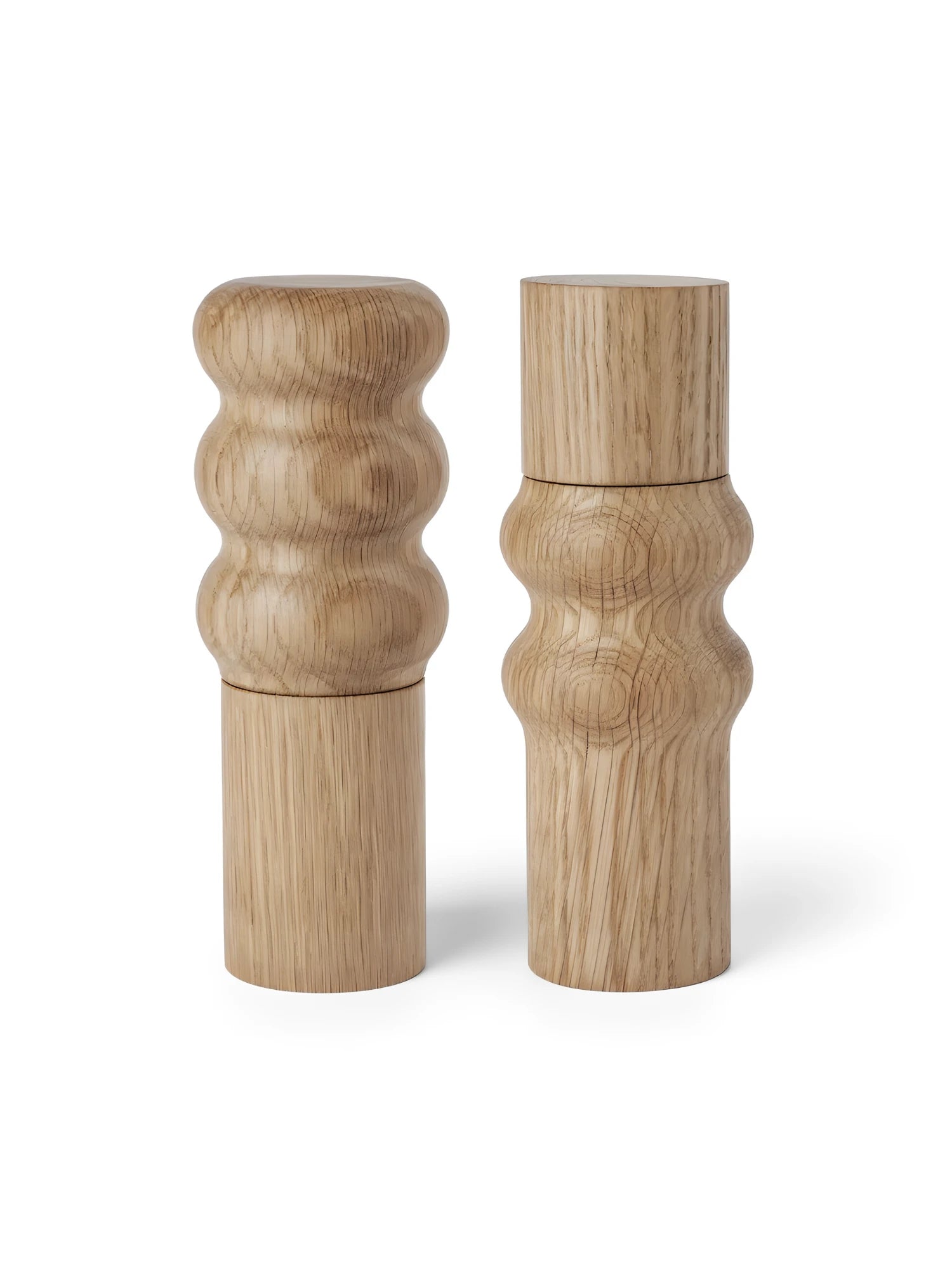 Pair of wooden salt and pepper shakers on a white background