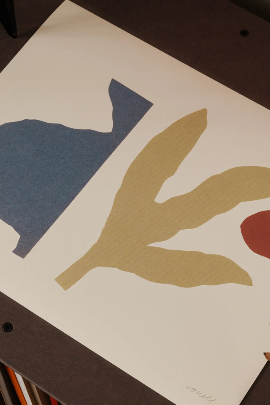 The Poster Club February Landscape, an abstract art print showcasing organic, cut-out style shapes in a palette of muted blue, warm ochre, and soft terracotta against a clean cream background.