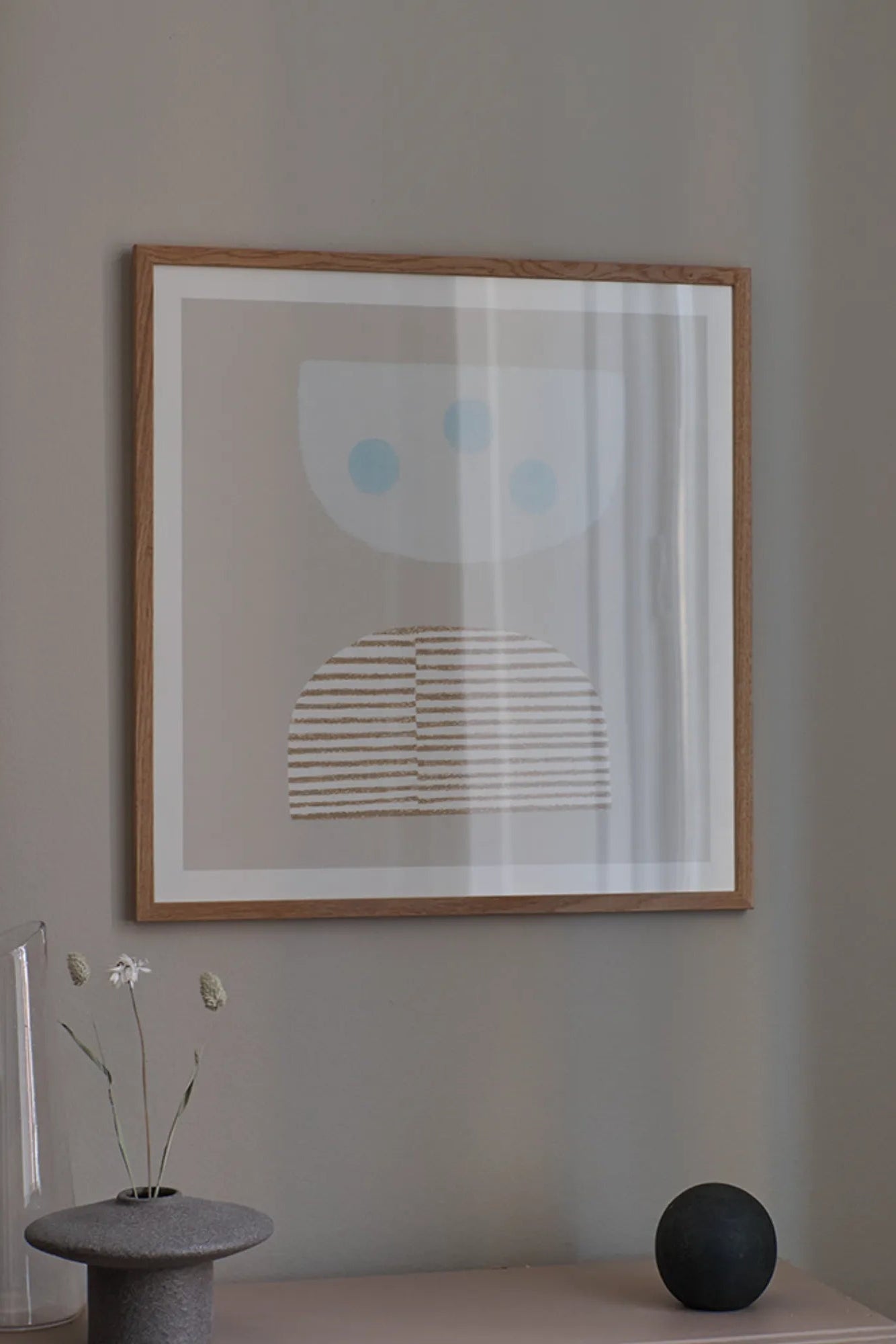Hand holding a basket of blue eggs in a sunny farm