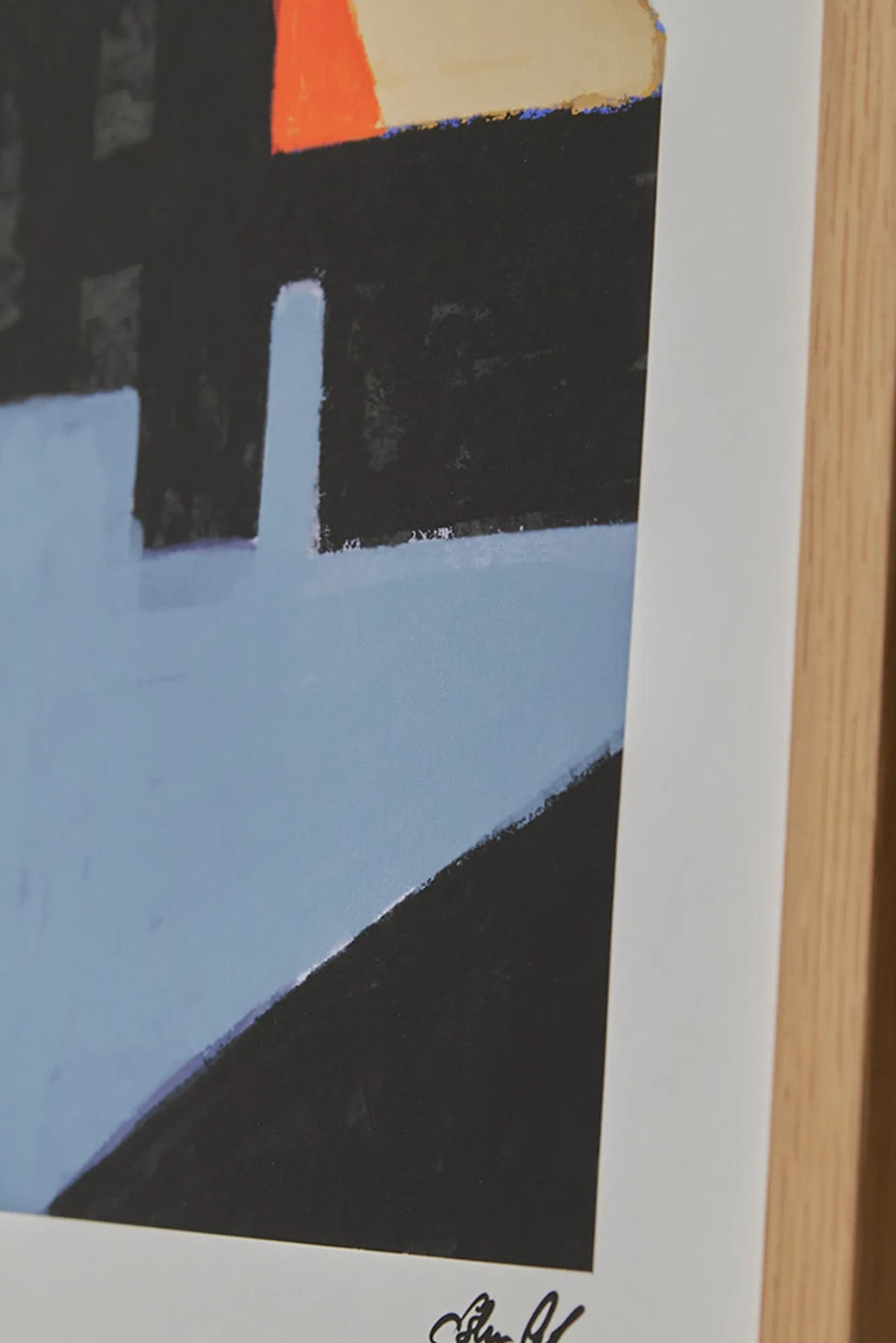 The Poster Club Kompromiss, a striking abstract art print featuring bold geometric shapes in dark charcoal black, periwinkle blue, bright orange, and soft beige tones with a painterly texture, elegantly framed in a light natural oak frame with a clean white mat. This modern wall art is perfect for contemporary living rooms, minimalist bedrooms, or creating a vibrant gallery wall.