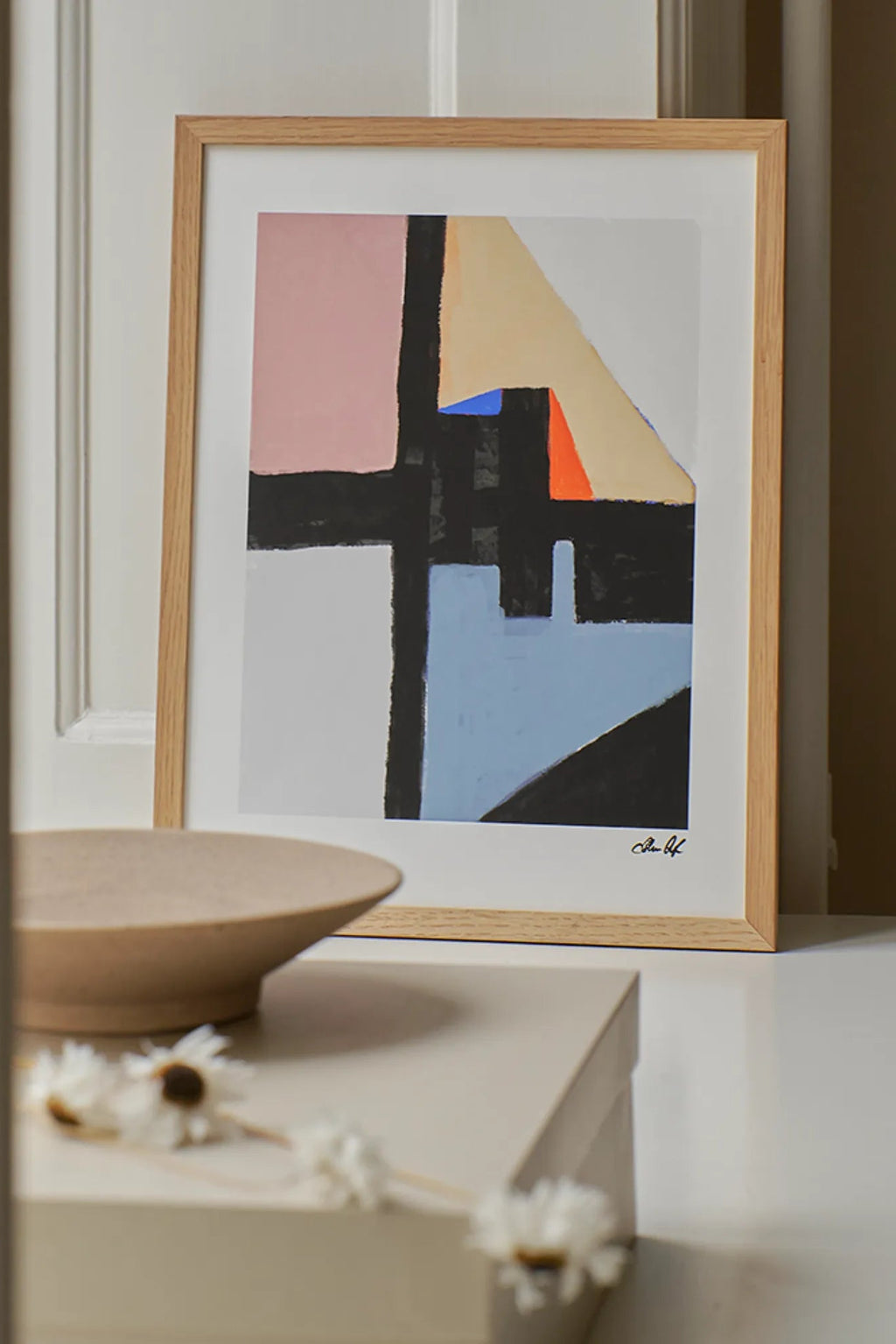 The Poster Club Kompromiss, a modern abstract art print showcasing bold geometric shapes in a vibrant color palette of black, pale pink, light blue, warm beige, and bright orange with painterly.