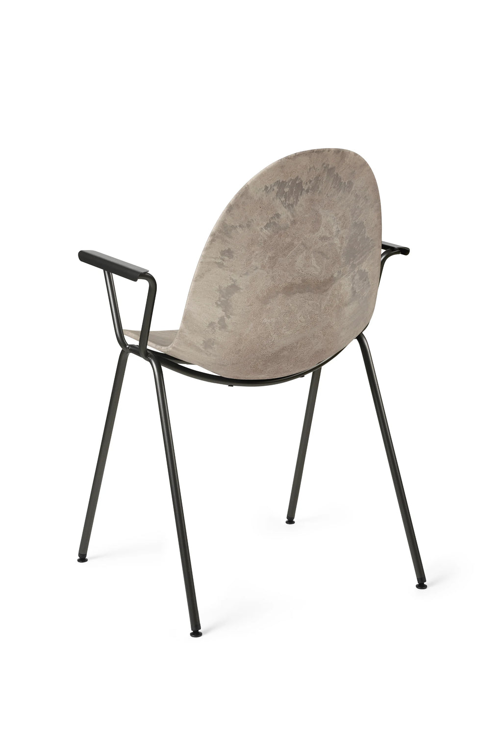 Mater Eternity Armchair, viewed from a rear-angle perspective on a clean white background. The chair's light brown, subtly textured backrest is prominently featured, showcasing its unique material and curved form. The slender black metal frame and armrests are visible, highlighting the chair's modern and minimalist construction.