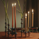 Elegant tall glass vase candle holder with silver base and intricate patterns