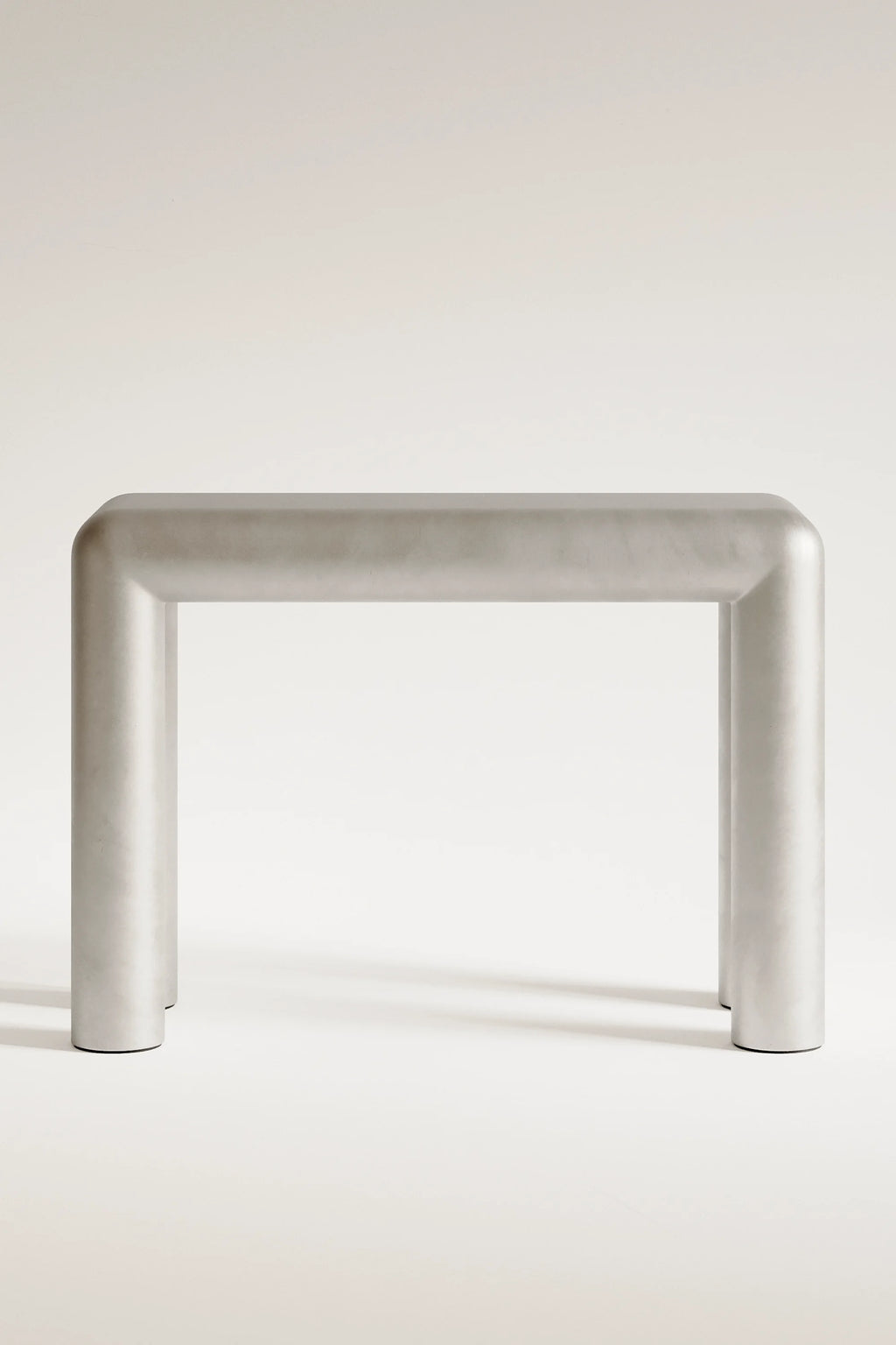 Metallic square stool on a white background