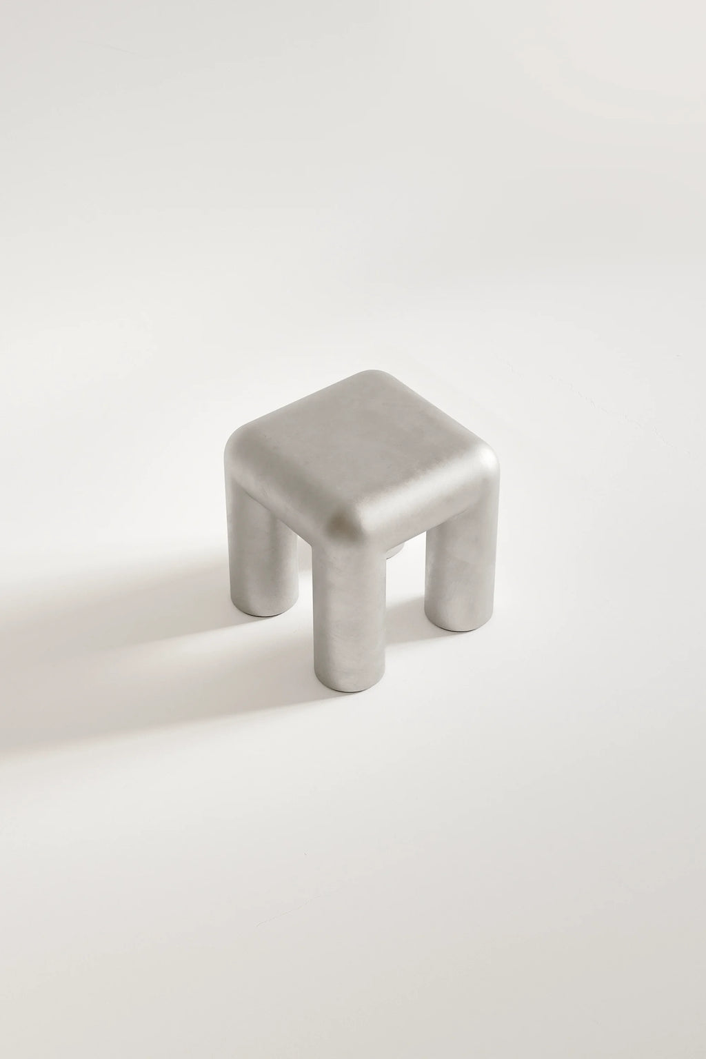 Metallic stool on a white background