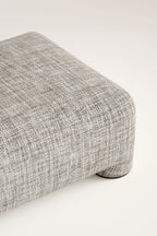 Gray textured ottoman on a white background