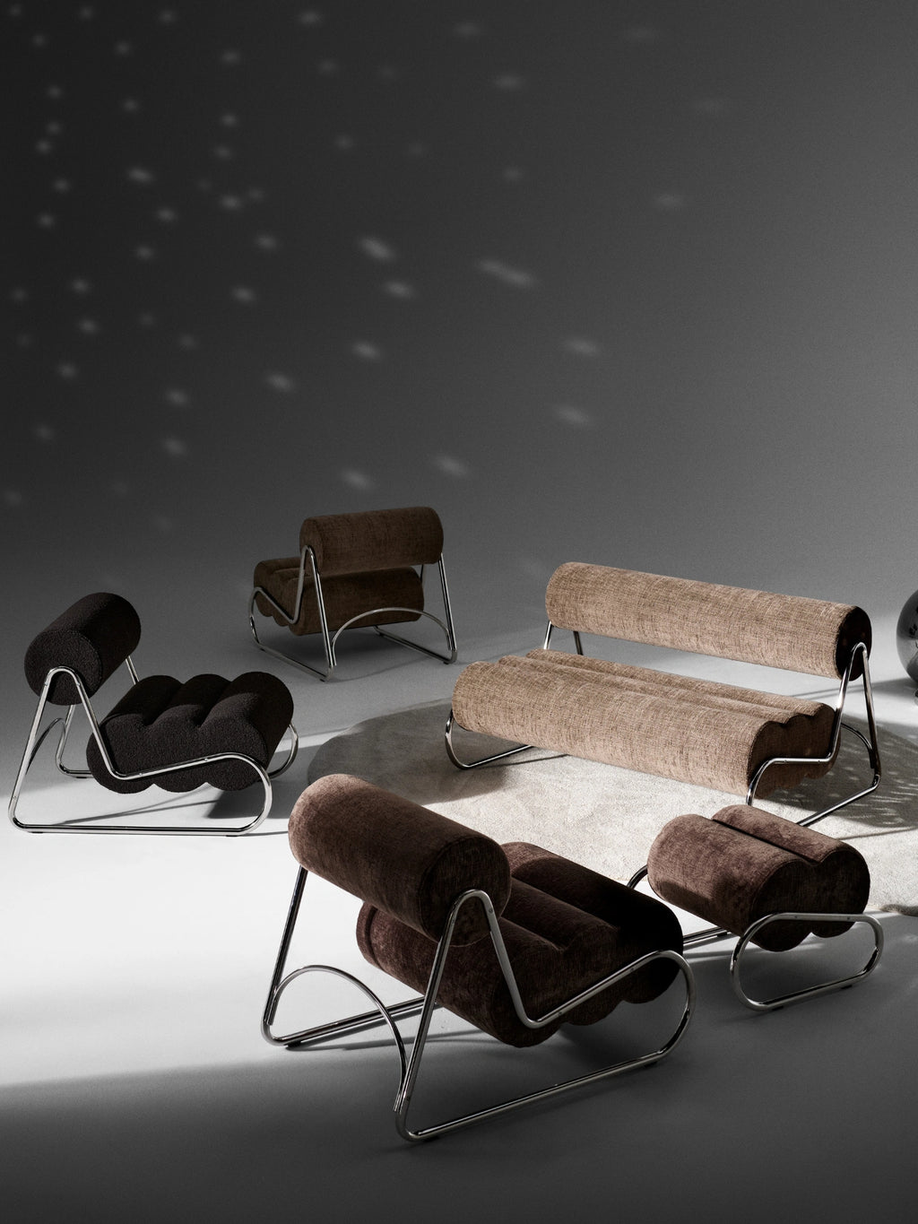 NORR11 Fave Footstool, a sculptural organic modern footstool featuring plush, ridged bouclé upholstery in rich chocolate brown, black, or light beige, supported by a sleek tubular chrome-.