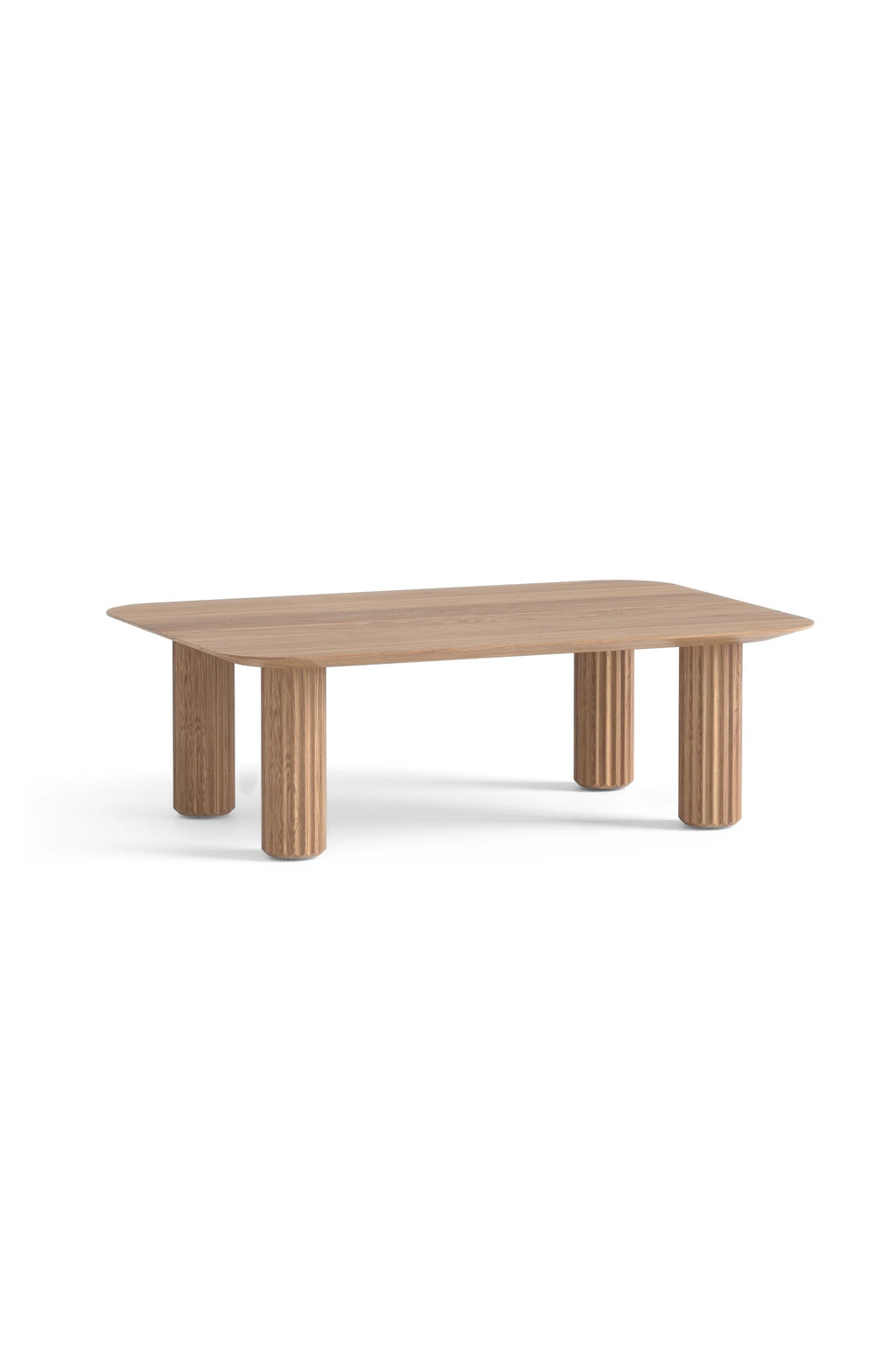 TAMO Filar Coffee Table, shown in a natural light brown wood, features a rectangular top with subtly rounded corners and four fluted, cylindrical legs. A luxury, contemporary wood coffee table for modern living spaces.