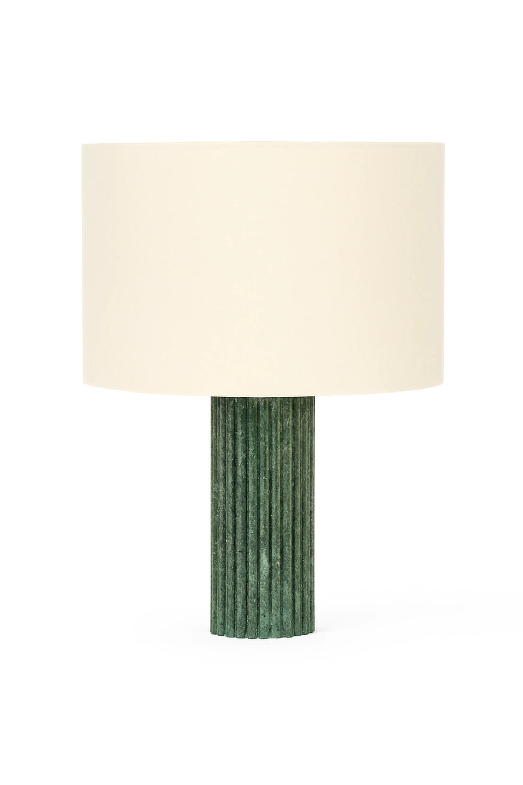 Table lamp with a green textured base and white shade on a white background