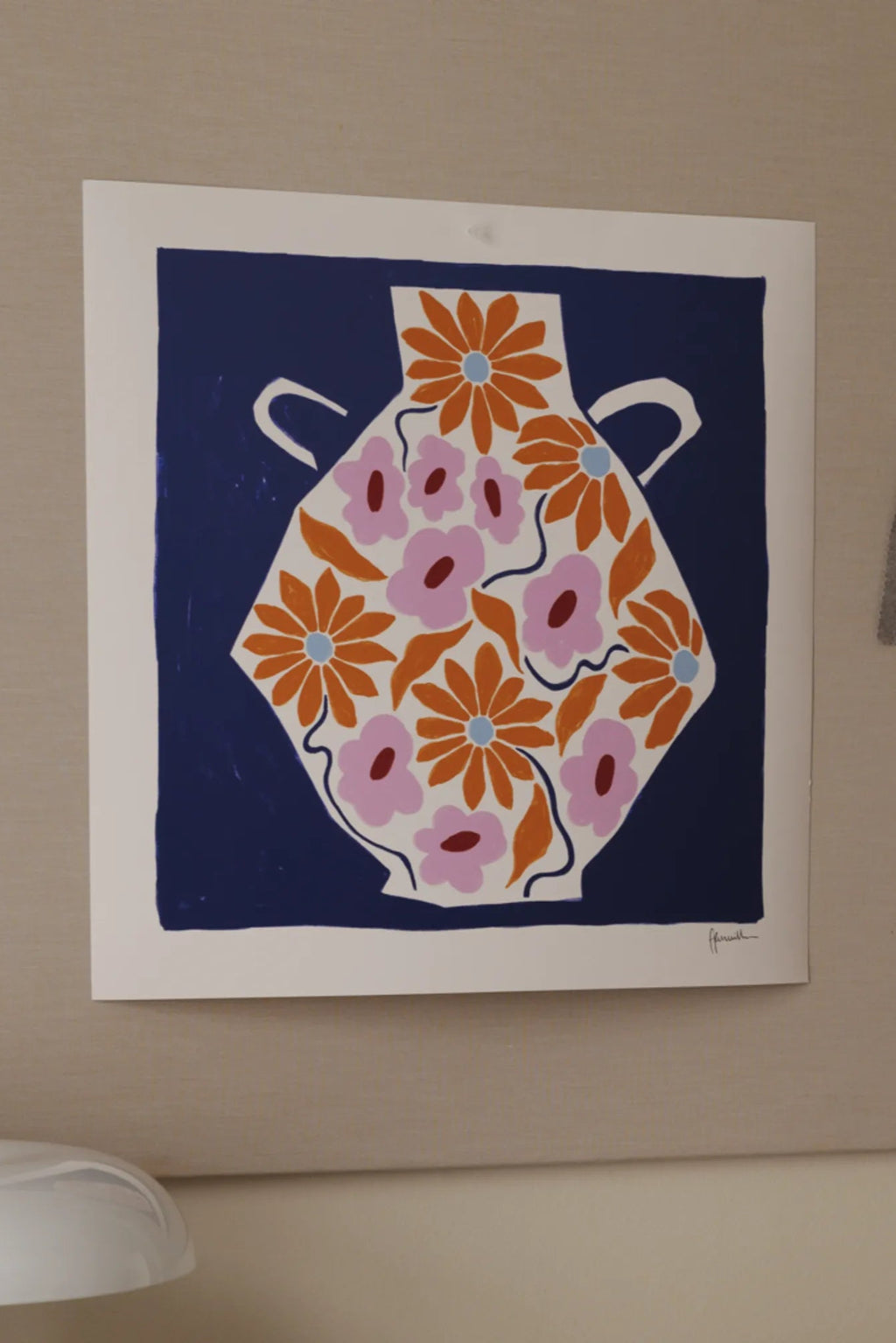 The Poster Club Sunflower Vase, a vibrant modern abstract art print featuring a stylized white vase filled with graphic orange sunflowers with light blue centers and soft pink flowers with dark pink centers, set against a bold dark blue background with hints of orange leaves and wavy blue lines. This colorful floral poster is perfect for adding a playful touch to contemporary living rooms, bedrooms, or gallery walls.