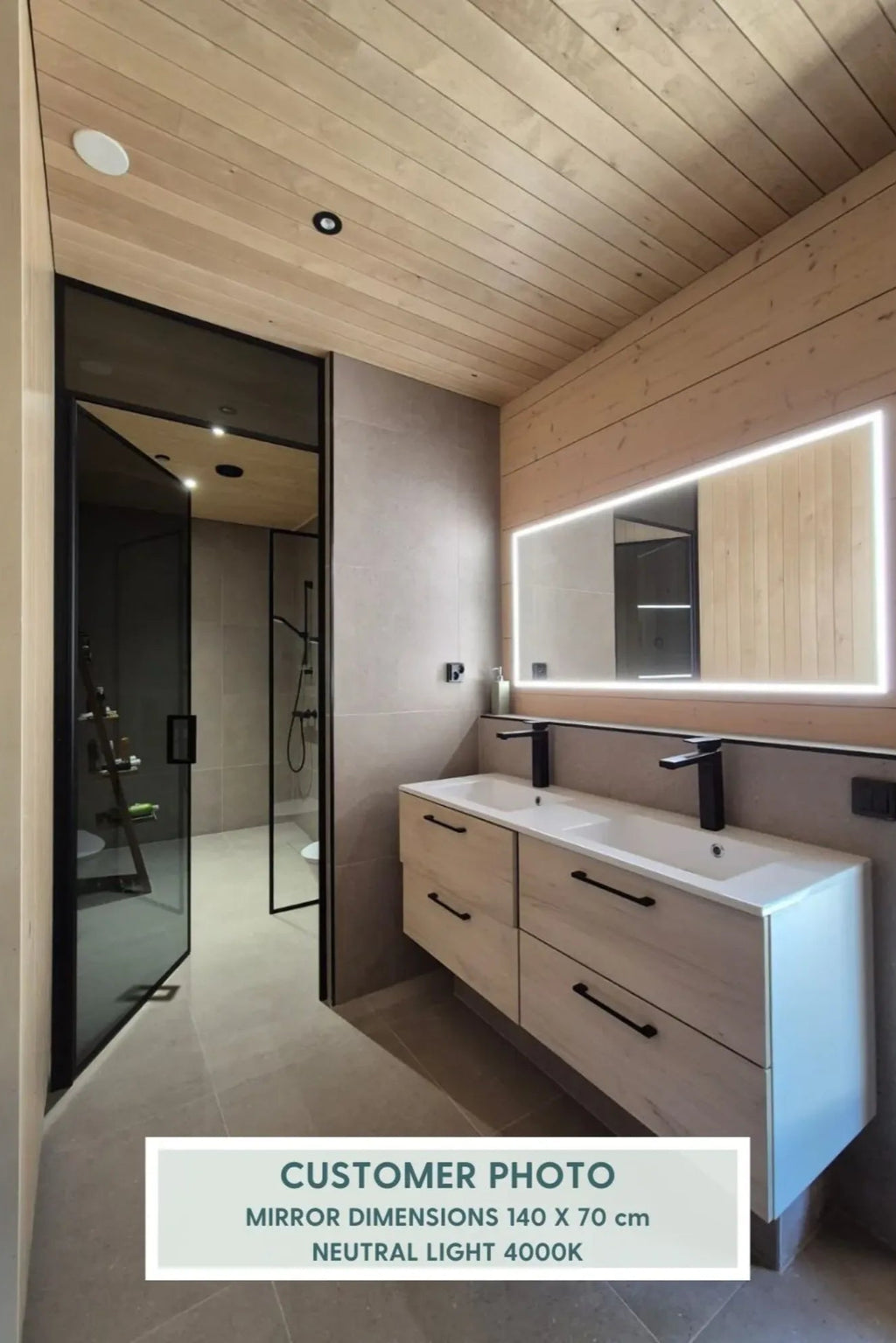 TCL Studios Full Lux Mirror With LED Lights, a large rectangular modern LED bathroom mirror featuring bright, integrated neutral light at 4000K around its perimeter, creating a sleek illuminated effect. This contemporary frameless vanity mirror, with generous 140 x 70 cm dimensions, is perfect for minimalist bathroom designs, spa-like master baths, or Scandinavian-inspired interiors.