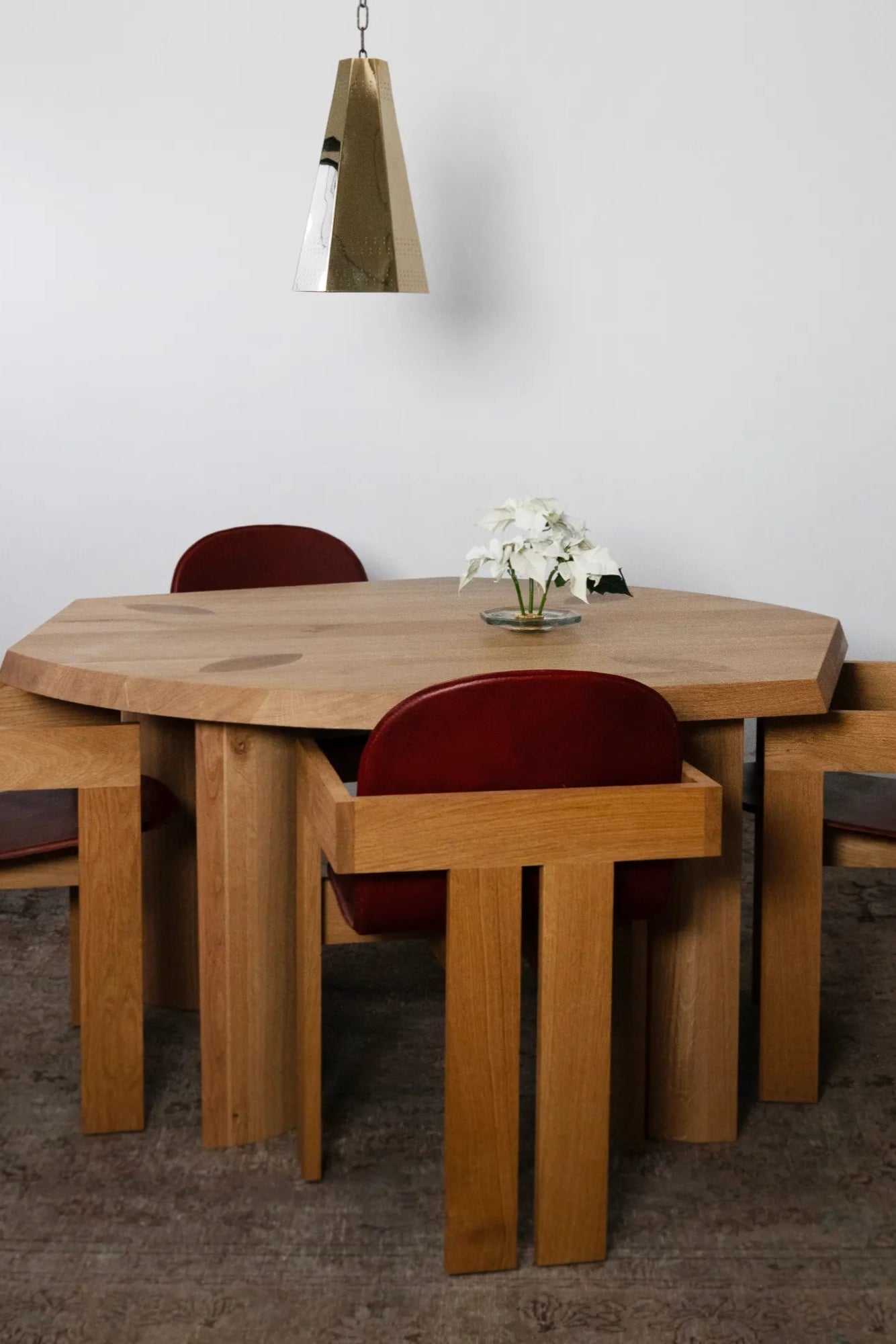  Large rectangular table with angled legs and contemporary design