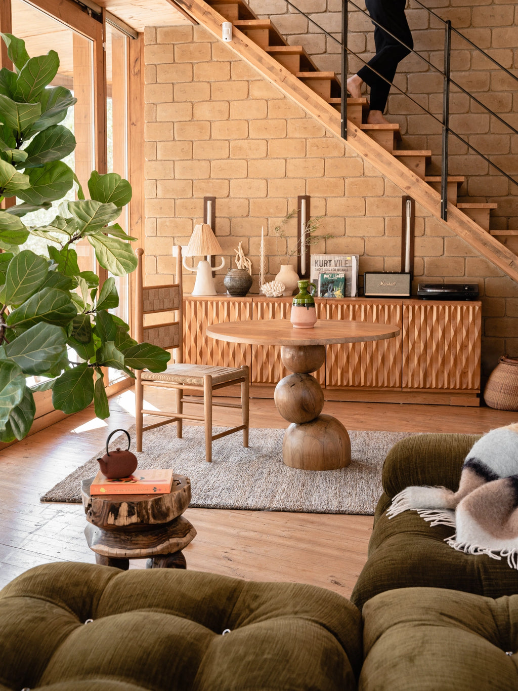 Heaps & Woods Luisa Console, an organic modern solid wood credenza featuring a distinctive carved facade with a faceted, geometric texture across its cabinet doors, presented in a warm natural wood finish. This contemporary rustic sideboard offers stylish storage for a living room, dining room, or entryway console table.
