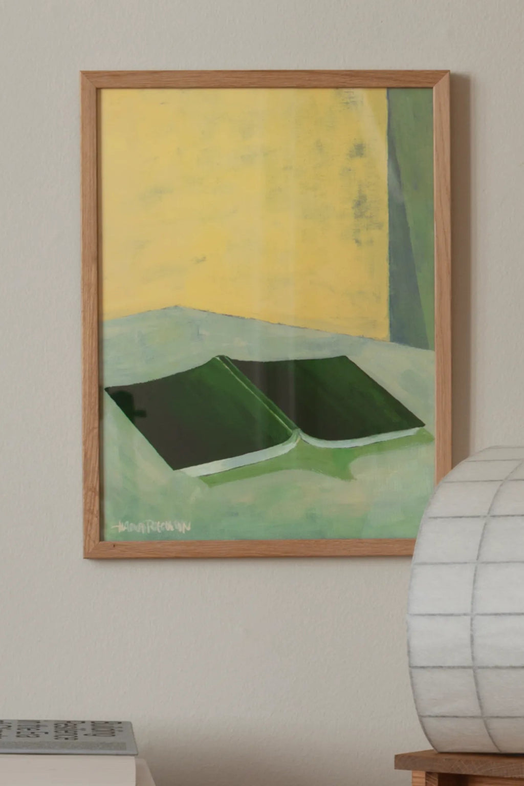 The Book is a hardcover novel with a colorful cover and intricate designs