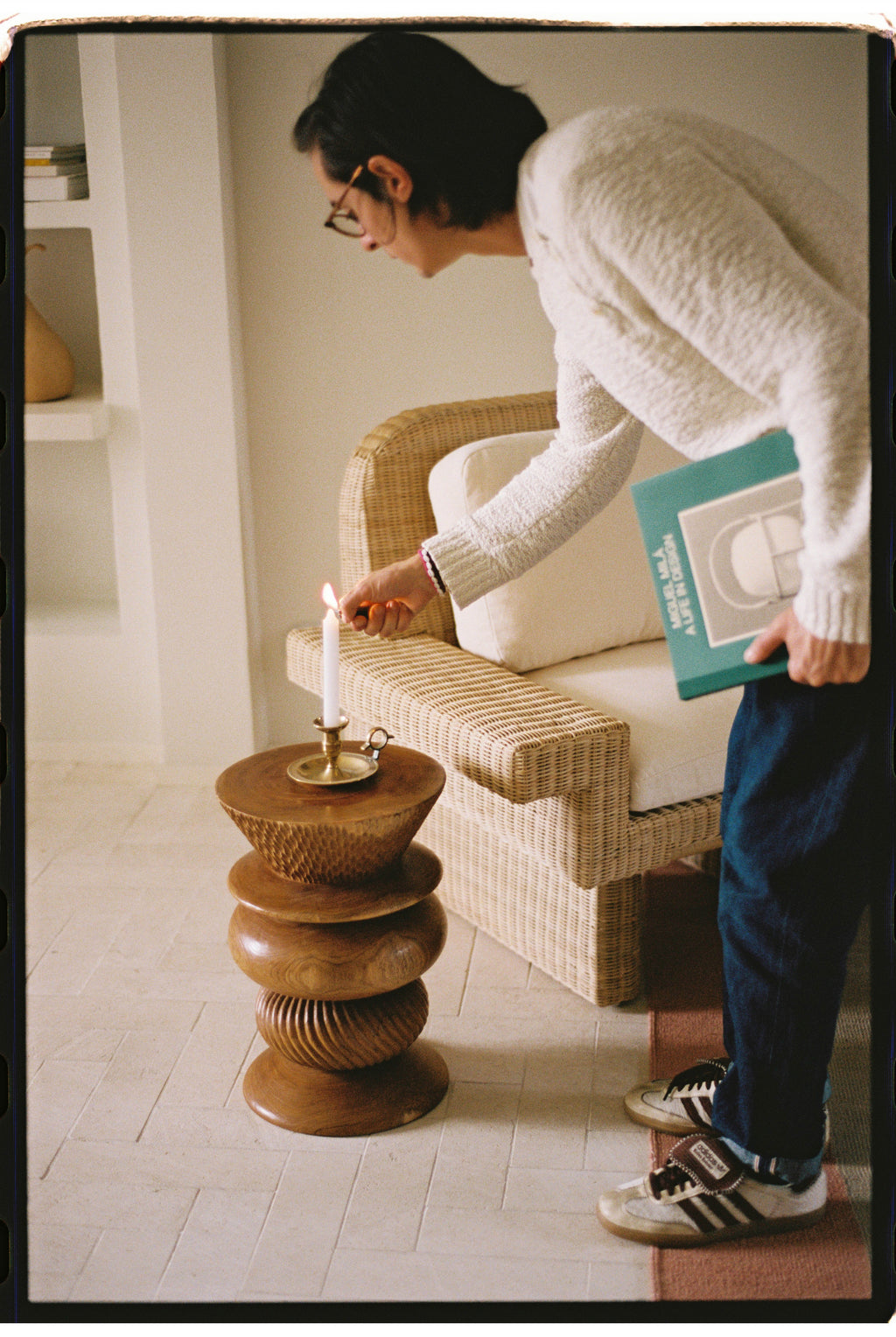 Heaps & Woods Nala Stool, a sculptural organic modern accent stool crafted from warm-toned solid wood with a unique stacked bobbin silhouette and varied hand-carved textures, including fluted and ribbed sections. This versatile wood side table is perfect for a living room, bedroom, or entryway, adding an artisanal touch to contemporary and minimalist interiors.