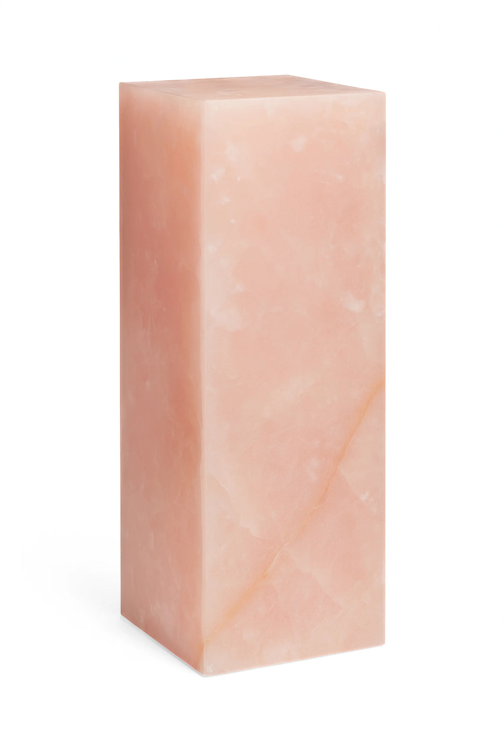 Rectangular pink onyx plinth on a white background