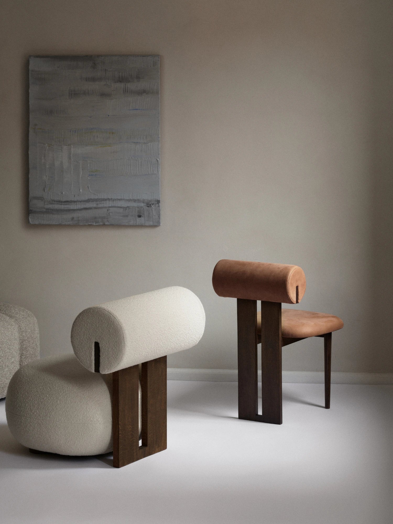 NORR11 Hippo Chair, a sculptural organic modern seating design featuring a robust dark solid wood architectural frame.