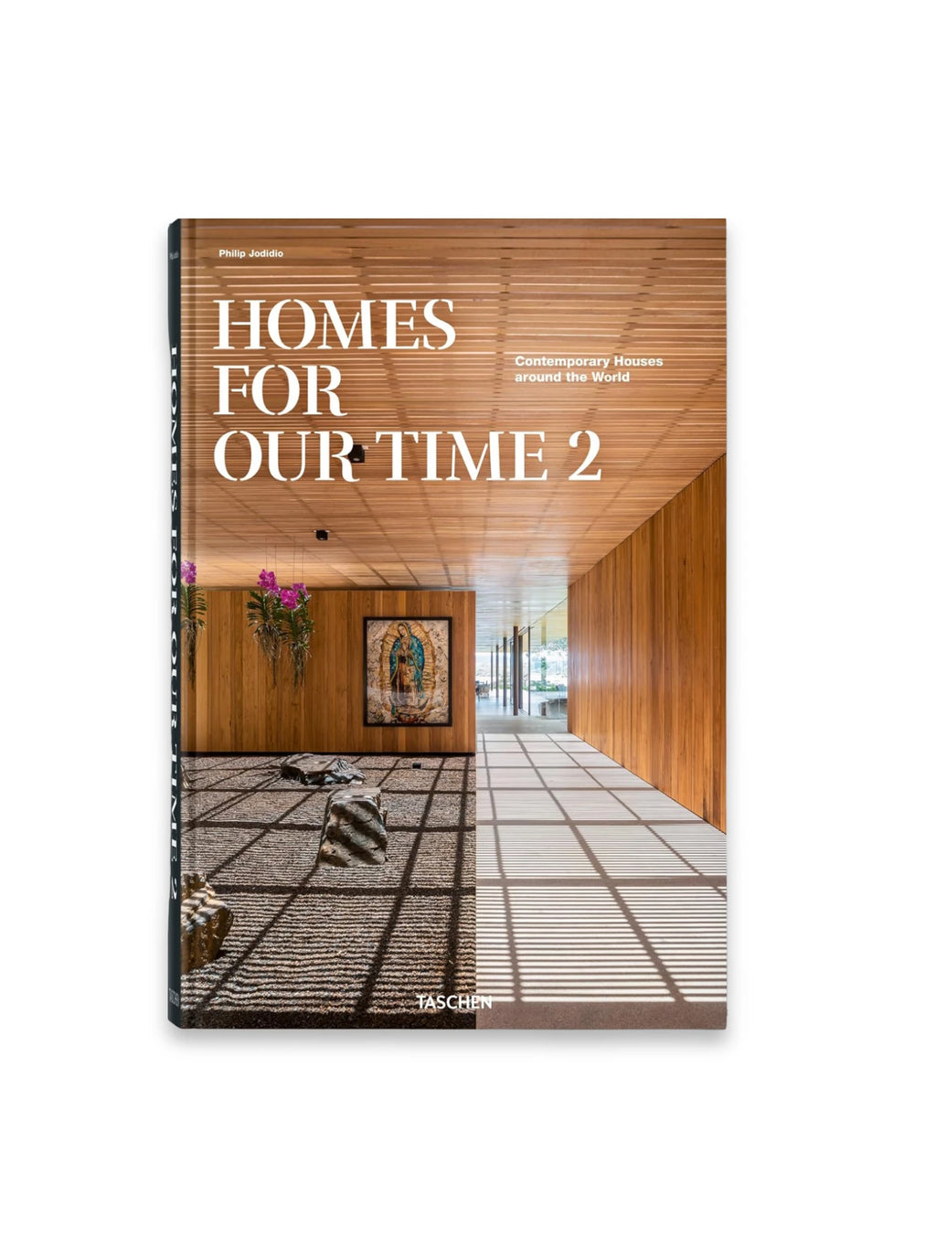 Book Homes for Our Time. Vol. 2, featuring a contemporary architecture cover with warm wooden paneling, a minimalist rock garden, and elegant natural light. This architecture design book is perfect for interior designers, architects, and home aesthetics enthusiasts.