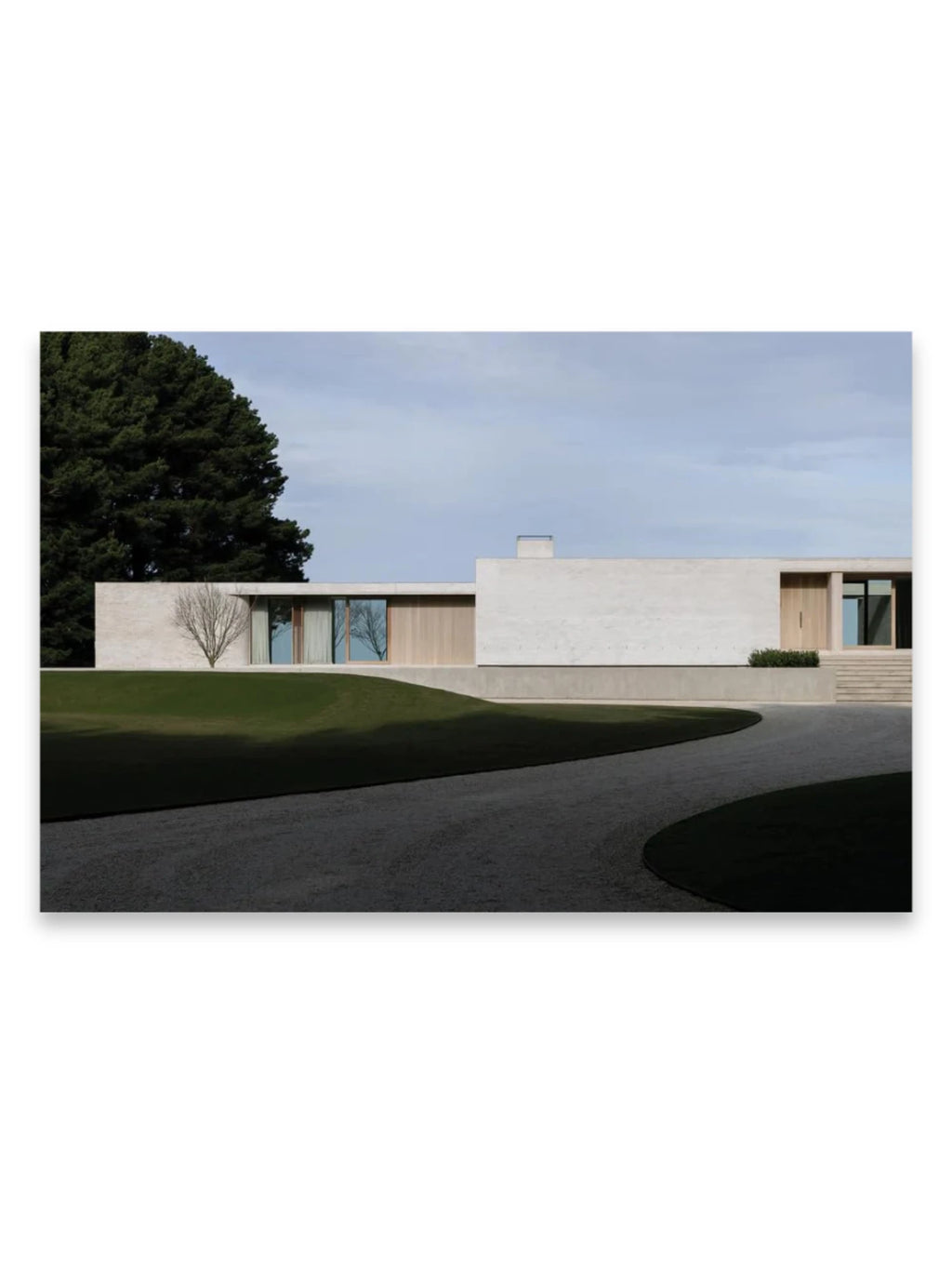 Book In Focus, a modern minimalist architectural design featuring a light-colored, textured concrete facade with warm wooden accents and large reflective windows. This stunning image is perfect for architecture enthusiasts and design professionals seeking inspiration for contemporary living spaces.