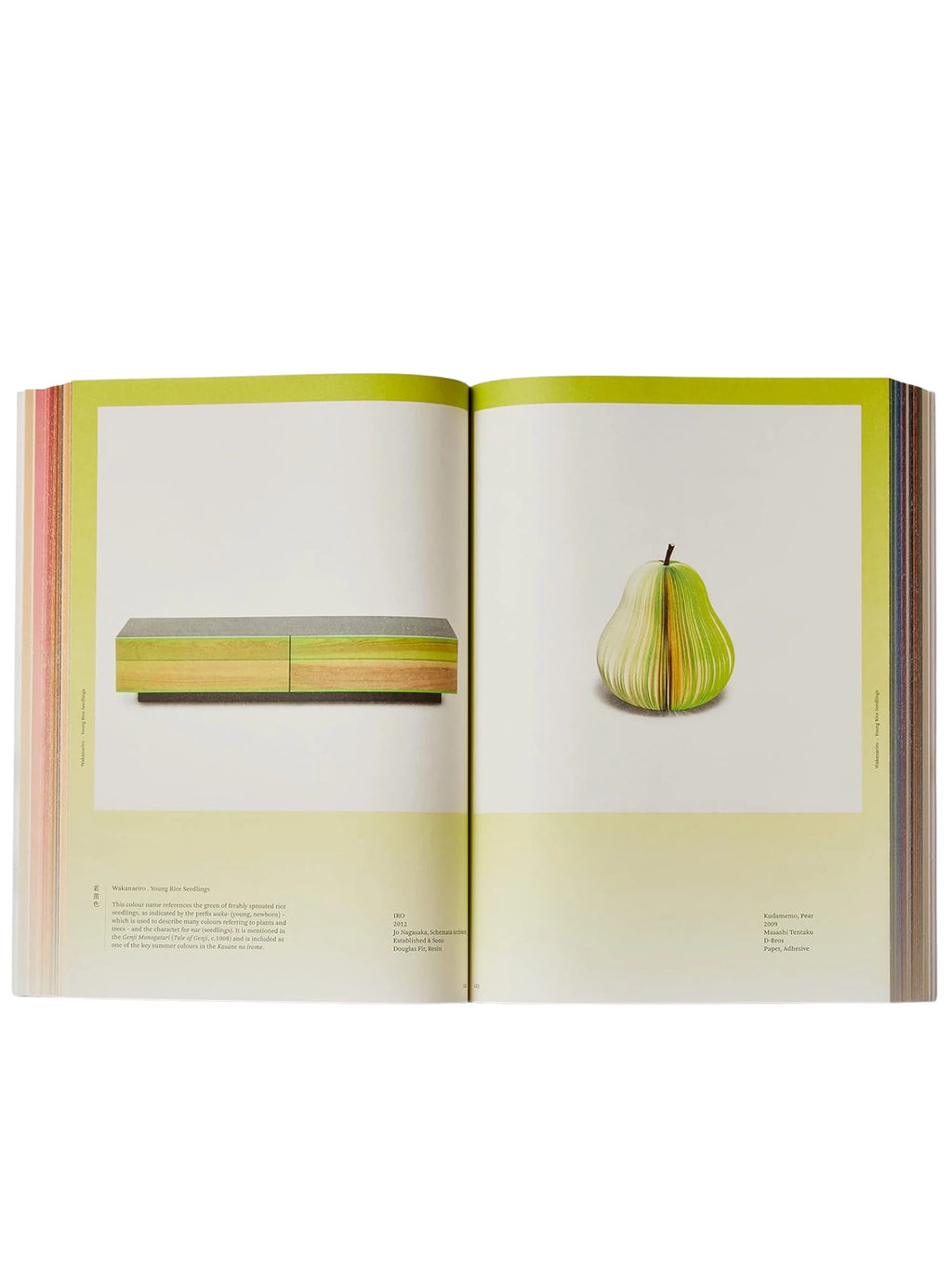 Book Iro - The Essence of Color in Japanese Design, showcasing an open spread with vibrant lime green page borders and crisp white content areas. The left page features a modern, gradient green and yellow wooden cabinet, while the right page displays a unique pear sculpture made from layered paper. This beautiful art book is perfect for designers, artists, and anyone interested in Japanese aesthetics and color theory.