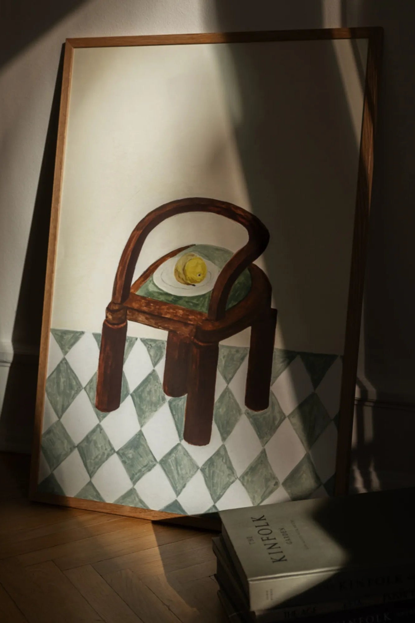 Comfortable brown leather chair with a bowl of fresh fruit on the side