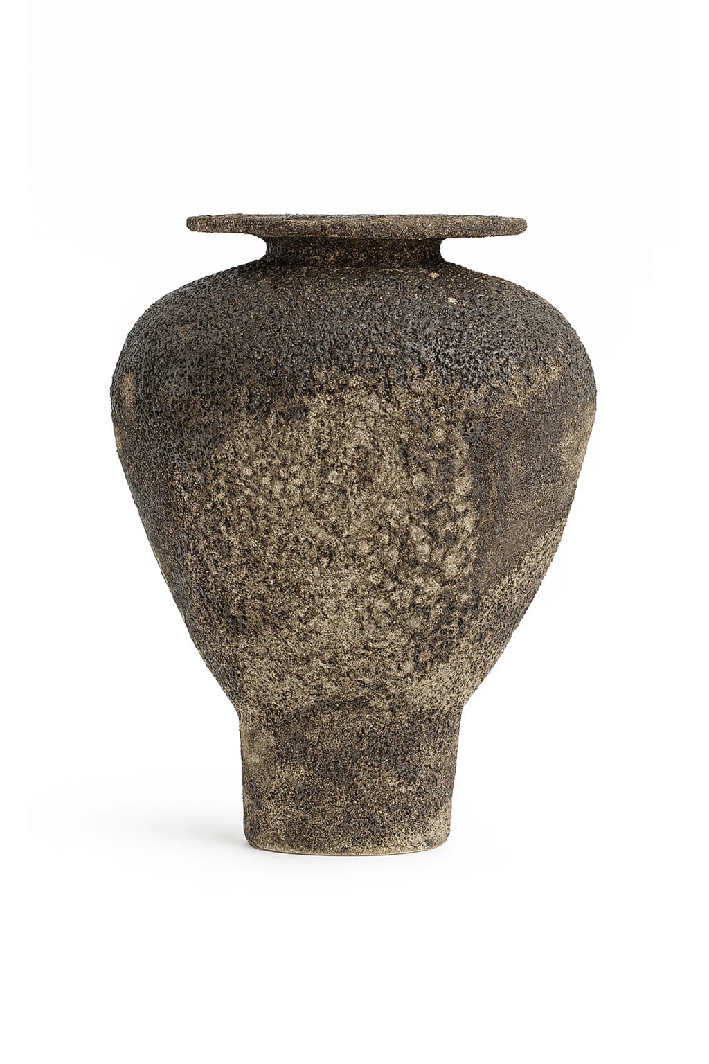 Canoa Lab Isolated n.7 Vase, a dark brown handcrafted ceramic vase with a distinctive porous volcanic texture and rich earthy tones that lighten towards the base.