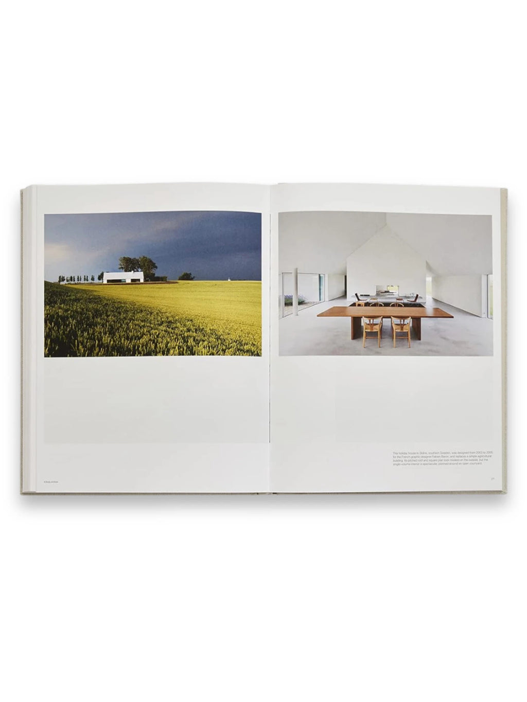 Book John Pawson - Making Life Simpler, an open book displaying two elegant architectural photographs. The left page shows a minimalist white house in a golden field under a dramatic sky, while the right page features a pristine white interior with a long wooden table and chairs, showcasing minimalist design. This essential architecture book is ideal for design enthusiasts and students seeking inspiration from modern, simple aesthetics.