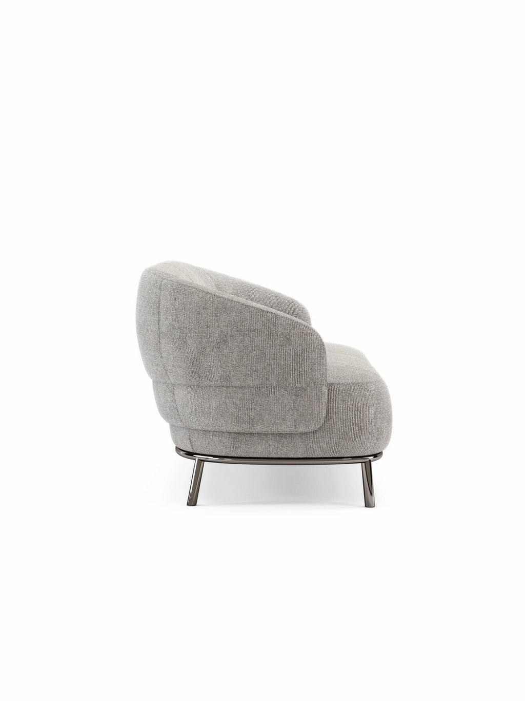 Domkapa Juliet Sofa, a contemporary light grey sofa with a plush, rounded silhouette and distinctive channeled upholstery on the back and arms, crafted in a soft woven fabric. It features a sleek dark gunmetal metal base, adding a modern touch to its luxurious design. Perfect for a chic living room or elegant apartment seeking a comfortable and stylish focal point.