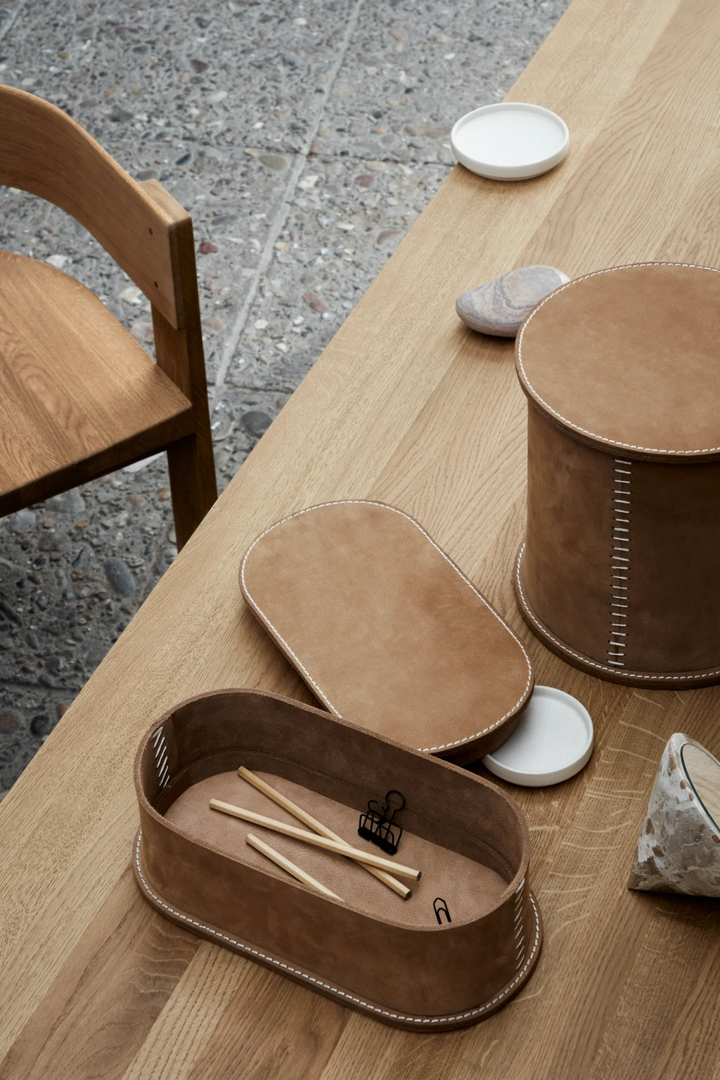 Kristina Dam Stitched Leather Box, a modern minimalist decorative storage solution crafted from warm tan leather with striking white hand-stitched details.