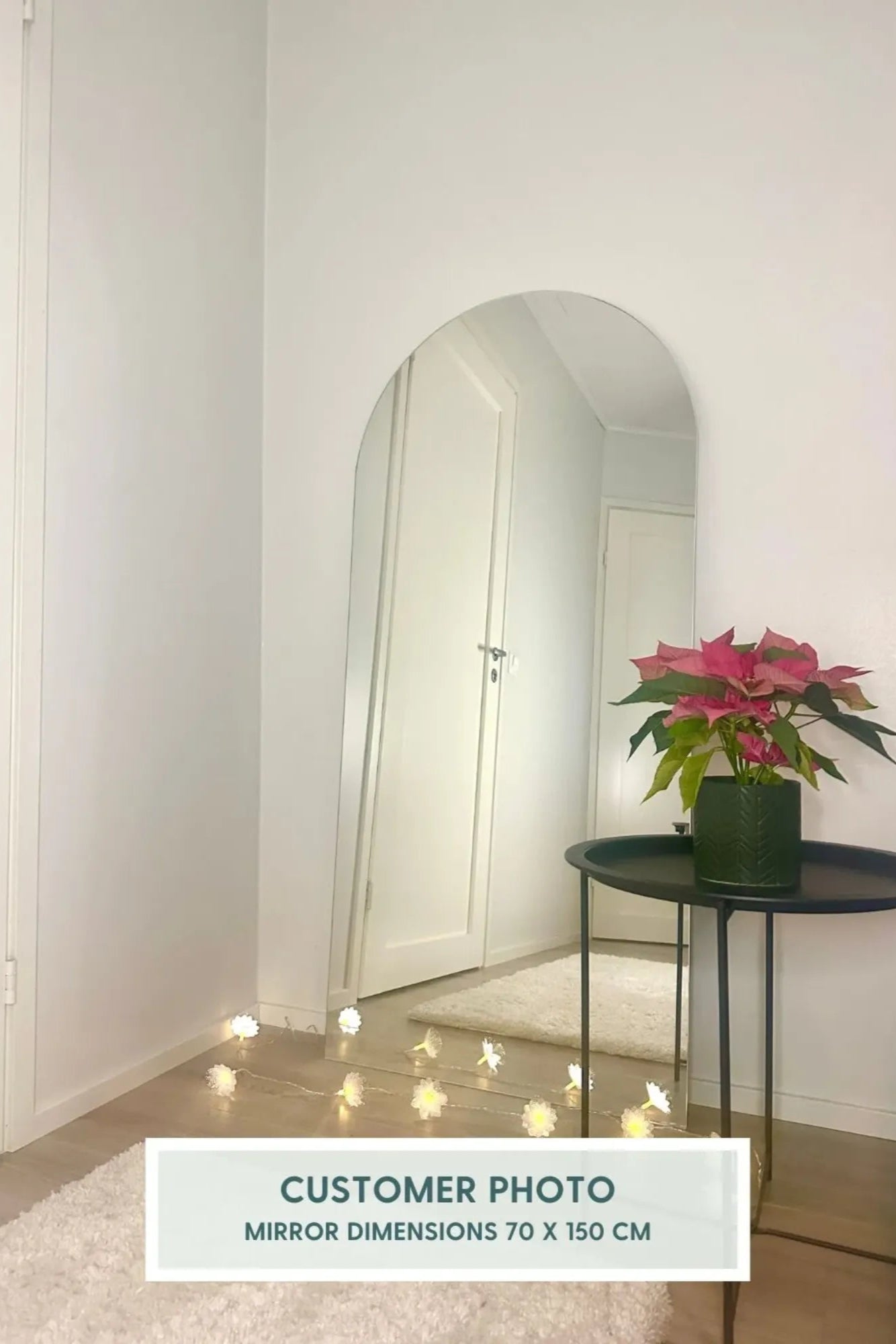 Tall mirror with curved frame for a touch of sophistication
