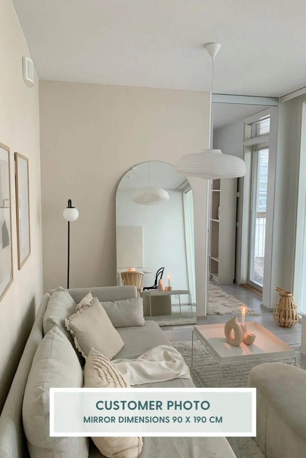 TCL Studios Arc Full Length Mirror, a modern minimalist frameless arched mirror featuring a sleek, tall design with a gently rounded top, creating a soft organic silhouette. This large contemporary floor mirror brightens any space by reflecting natural light, making it ideal for Scandinavian living rooms, chic bedroom accents, or elegant entryway decor.