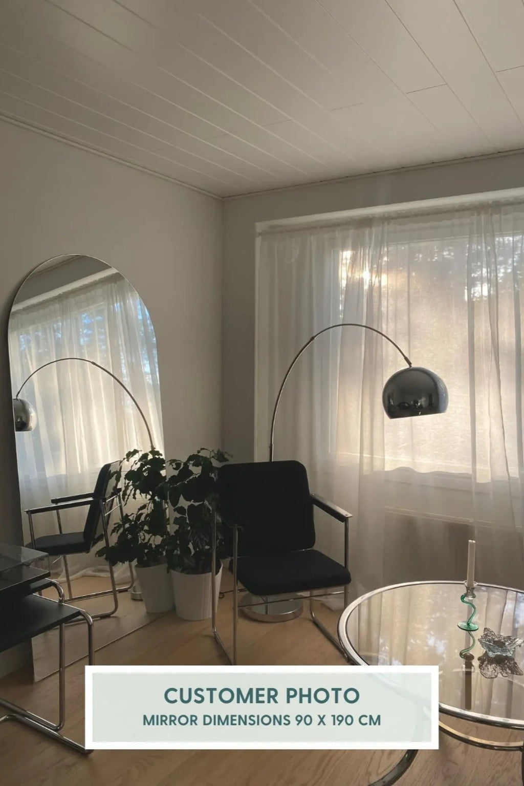 TCL Studios Arc Full Length Mirror, a sleek modern minimalist full-length floor mirror featuring a distinctive arched top and straight sides, creating a sophisticated frameless look with its polished silver surface.