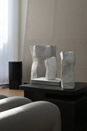 Large white vase with a unique shape and textured surface