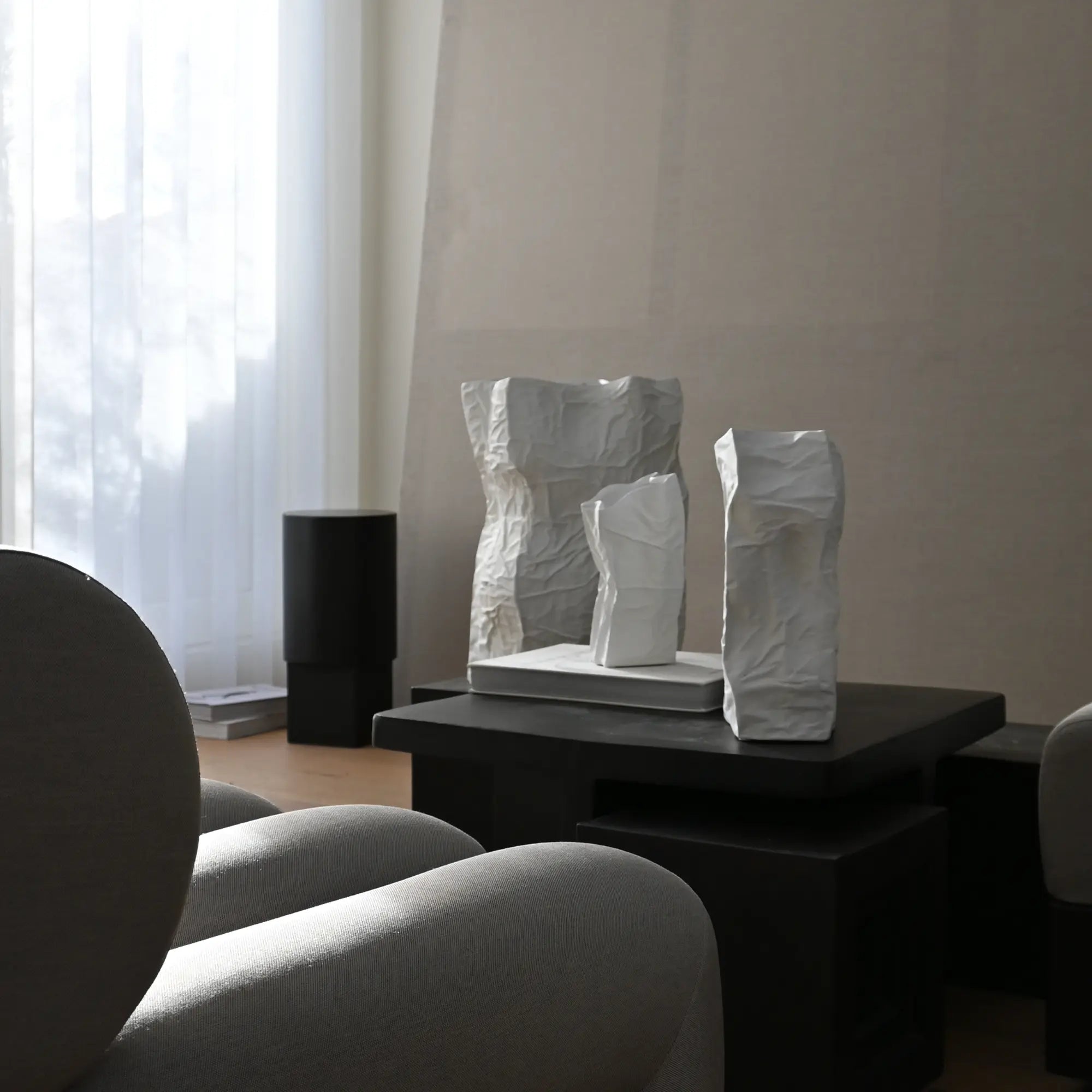 Large white vase with a unique shape and textured surface