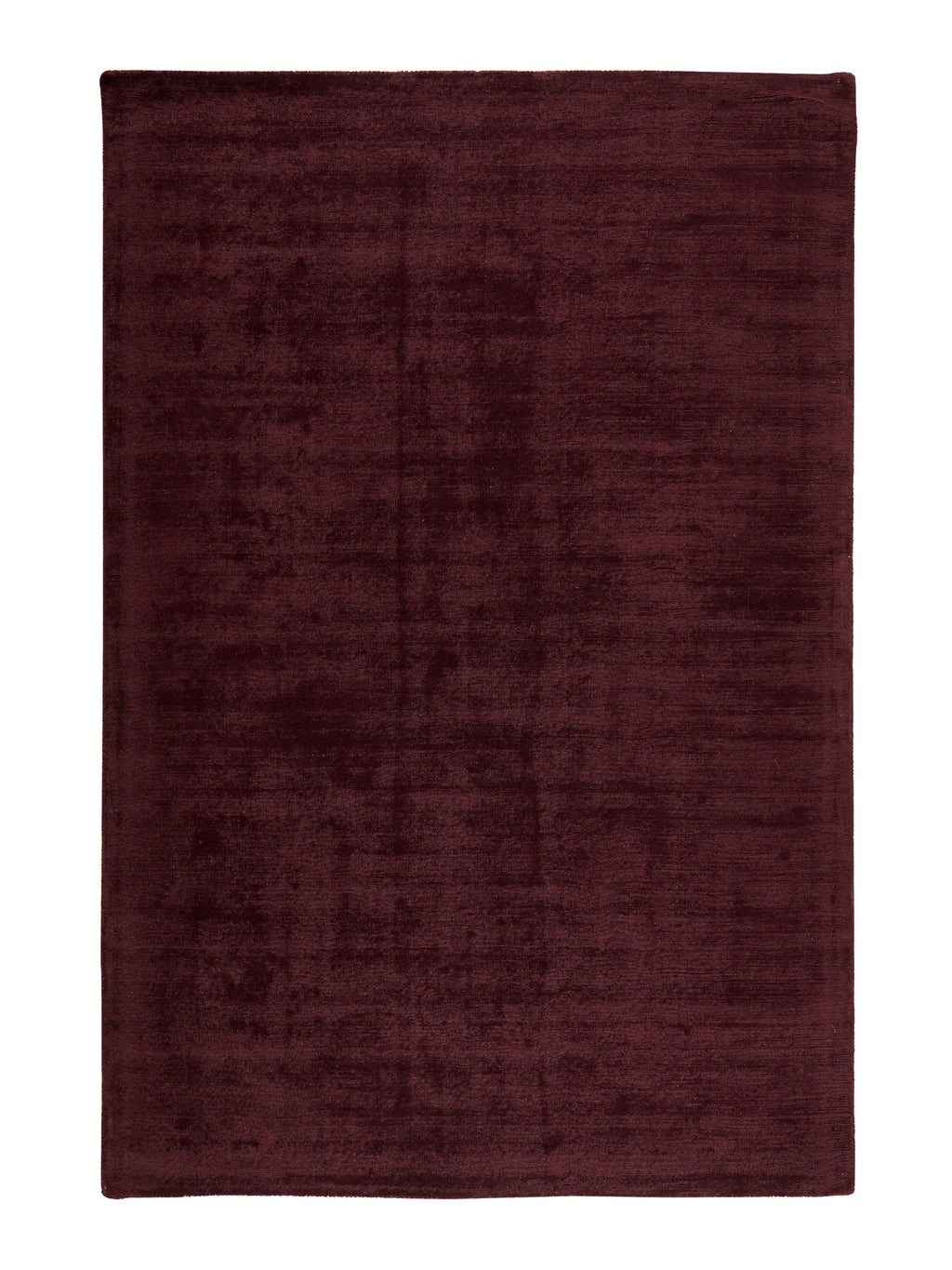 Dark purple rug on a white background