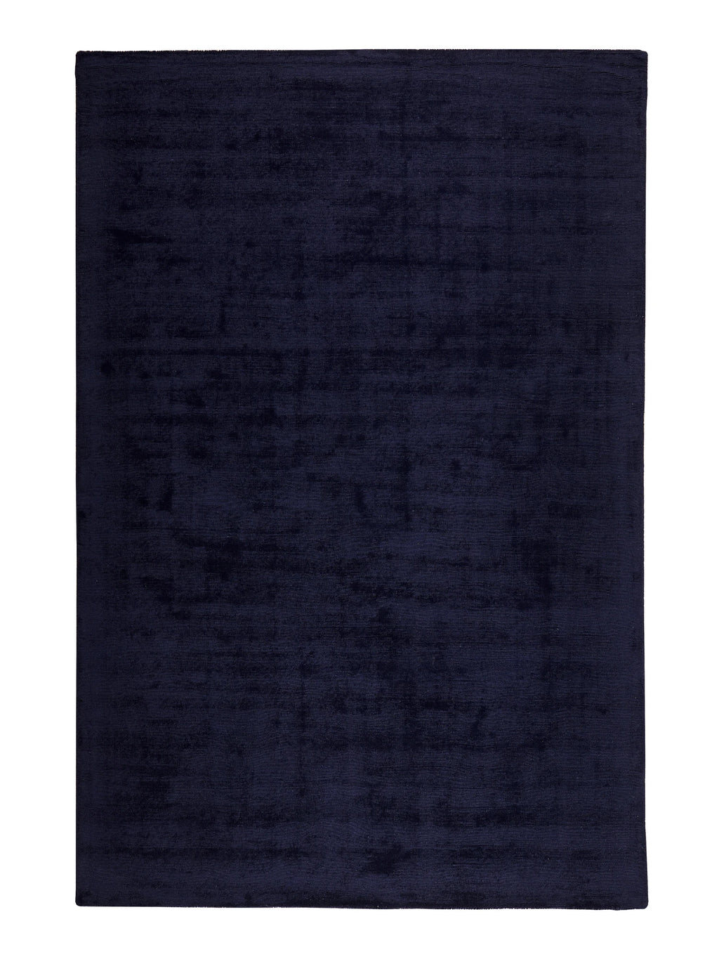 Navy blue rug on a white background