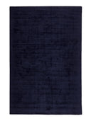 Navy blue rug on a white background