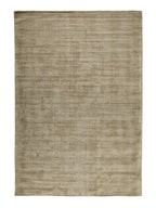 Beige area rug on a white background