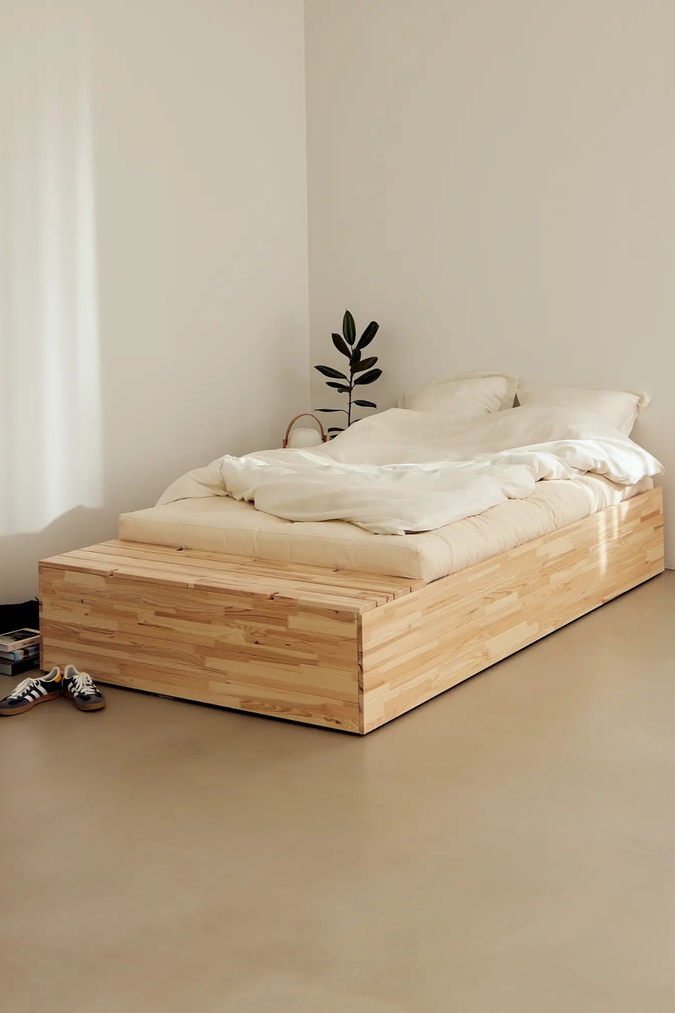 Luxurious basement suite with elegant bed and plush bedding