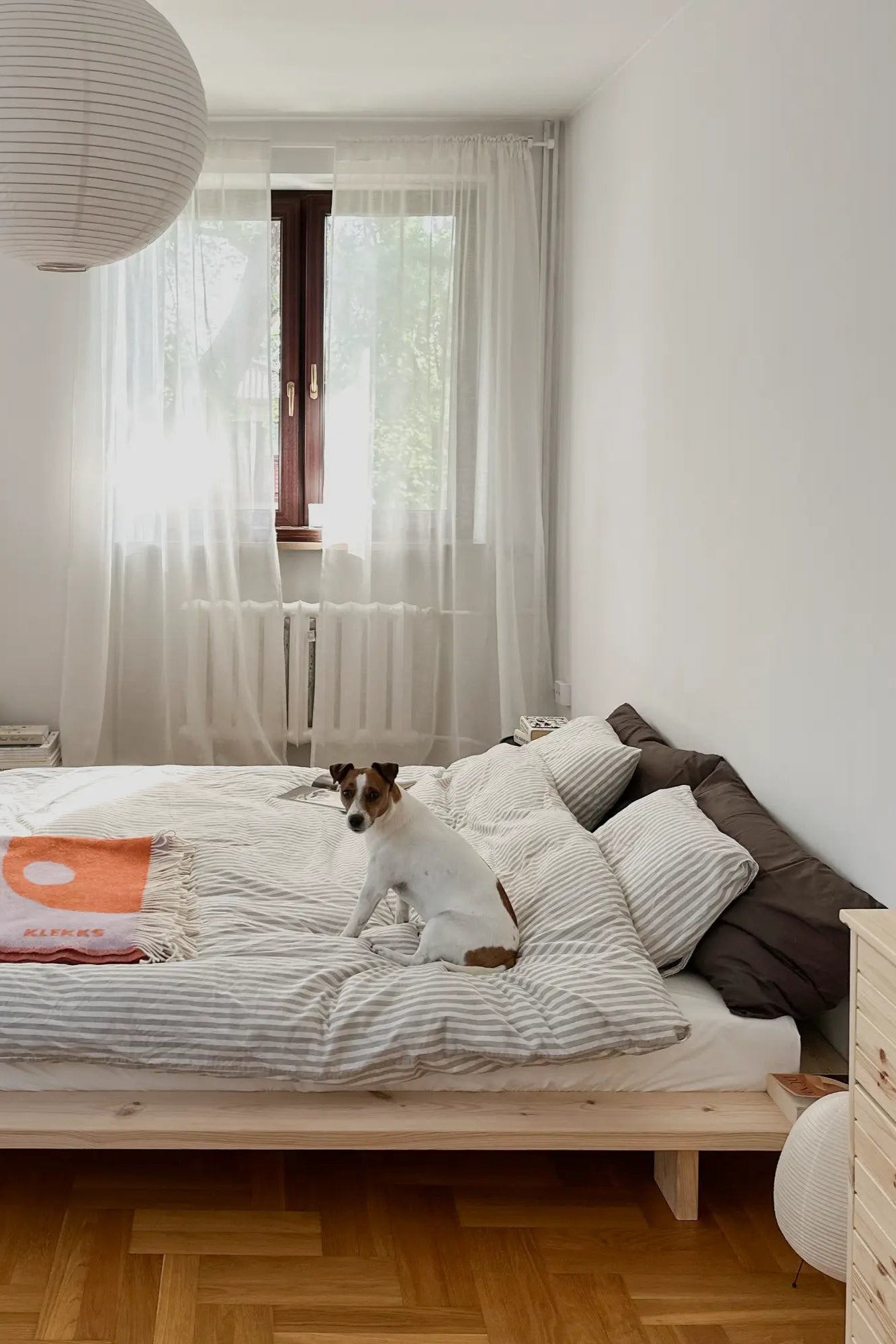 Handcrafted Japan Bed made from raw, untreated wood for a natural, minimalist look and feel in a modern bedroom setting