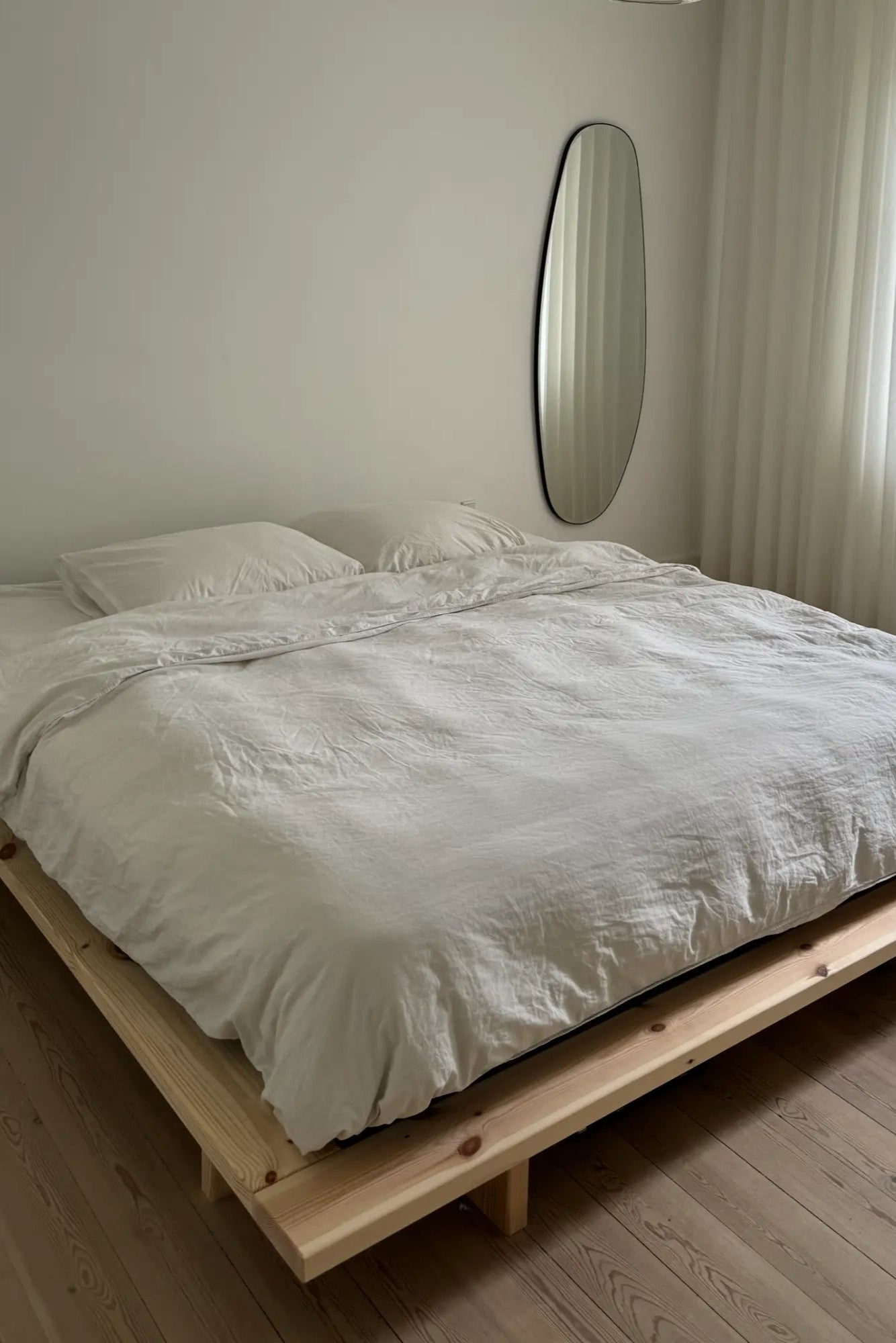 A traditional Japanese-style bed made of raw, natural materials